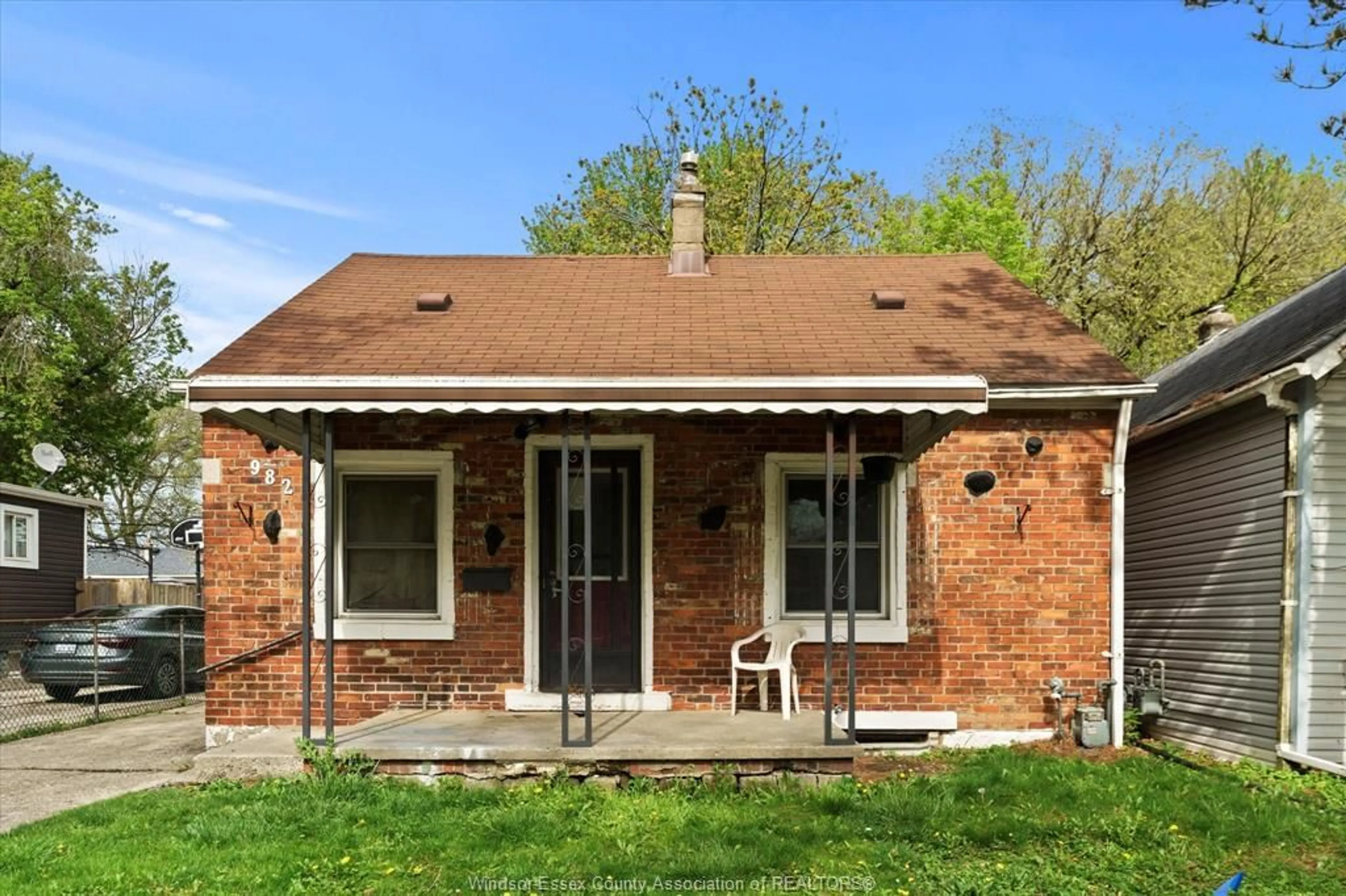 Home with brick exterior material, street for 982 BRIDGE Ave, Windsor Ontario N9B 2N1