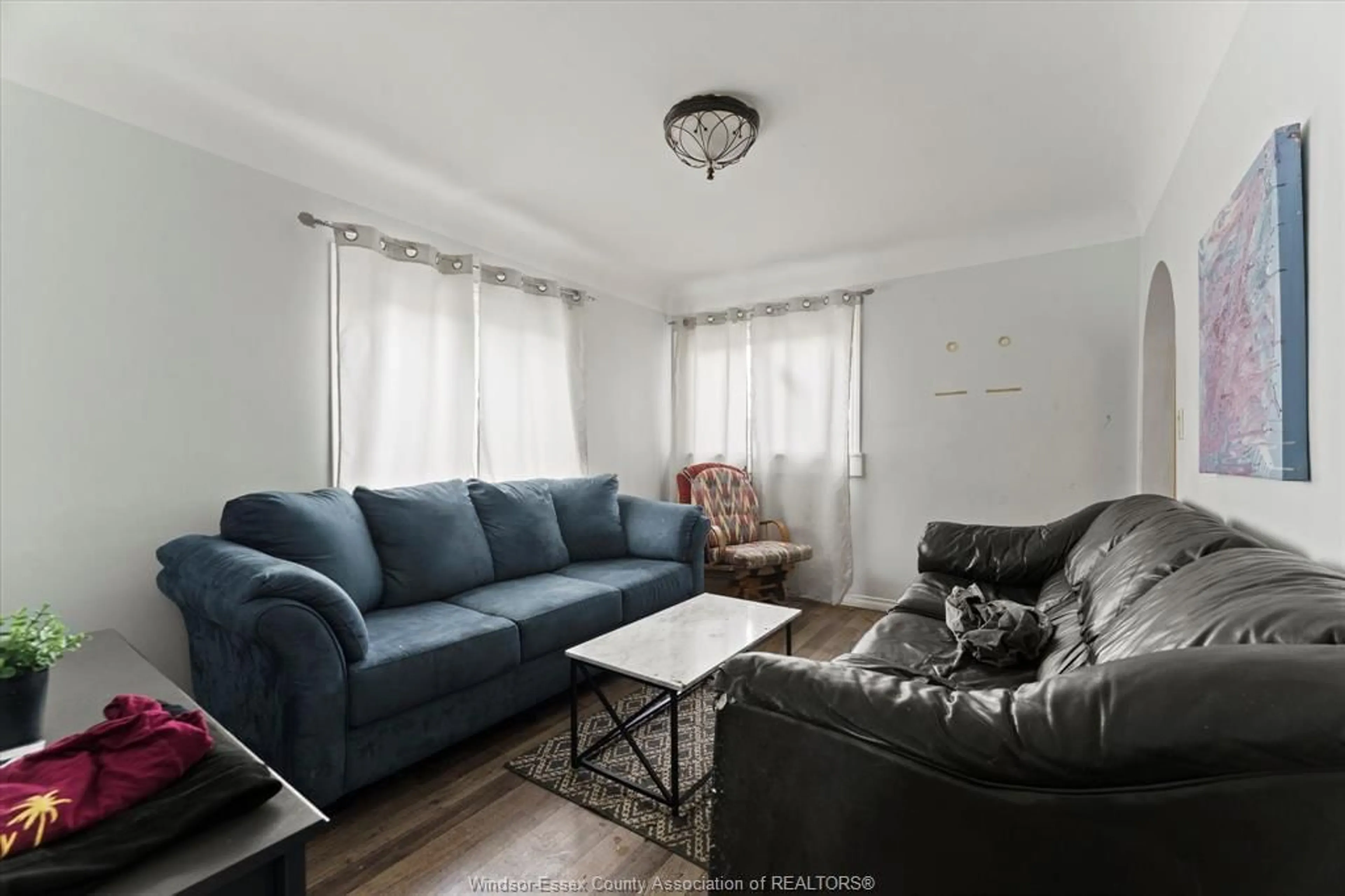 Living room with furniture, unknown for 982 BRIDGE Ave, Windsor Ontario N9B 2N1