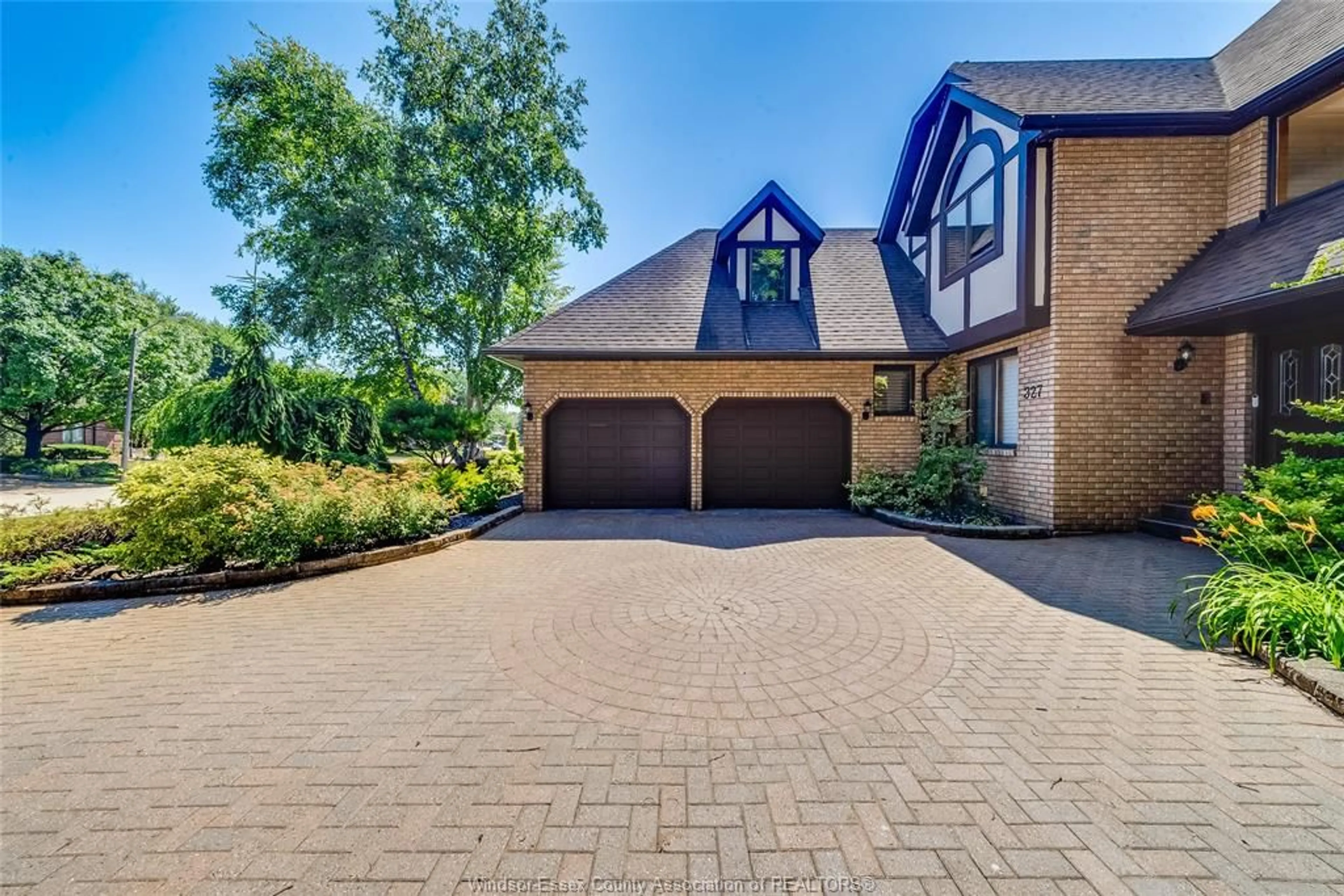 Home with brick exterior material, street for 327 MAJESTIC Dr, Lakeshore Ontario N8N 4L4