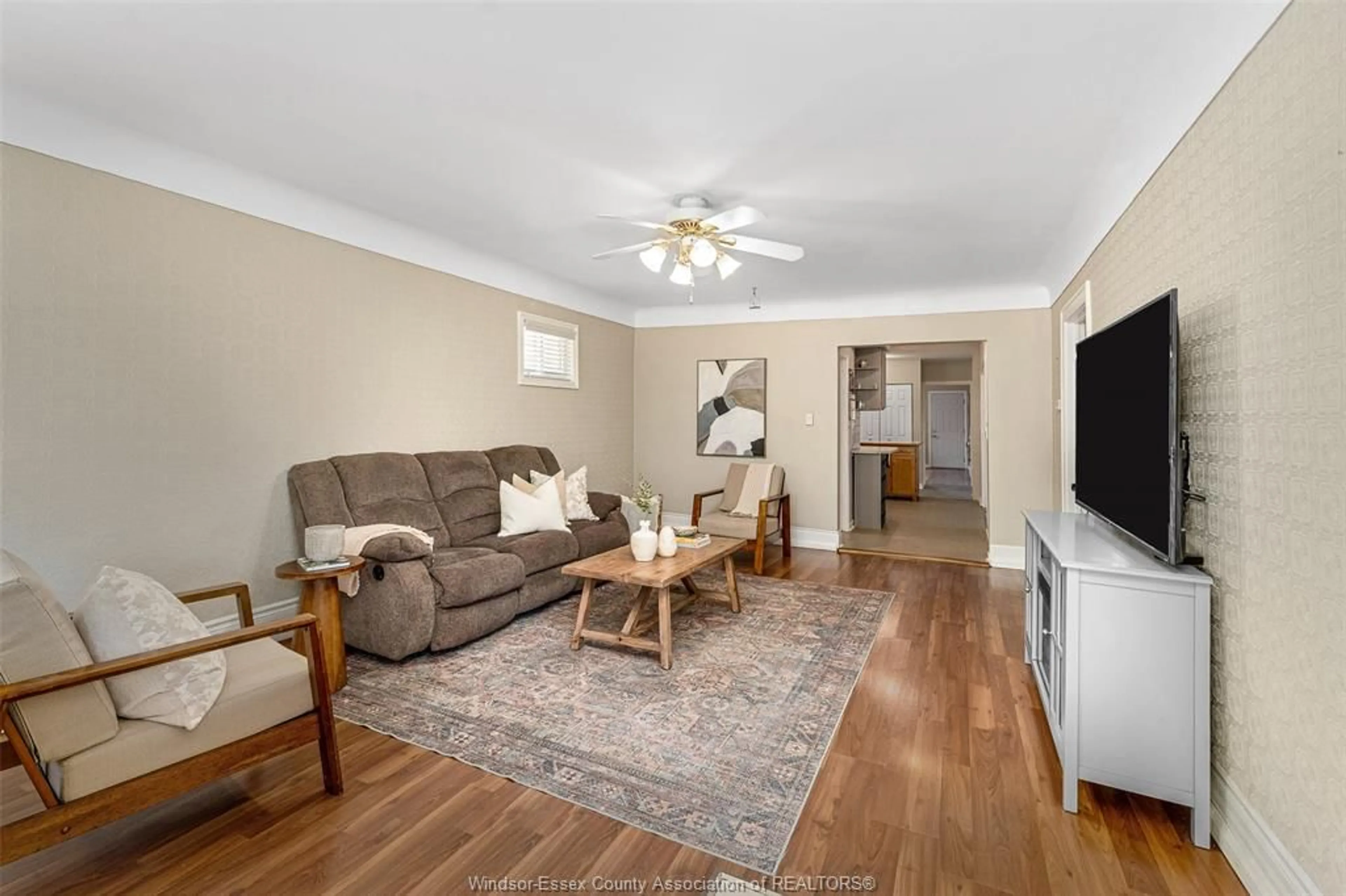 Living room with furniture, wood/laminate floor for 948 Jefferson, Windsor Ontario N8S 2R1