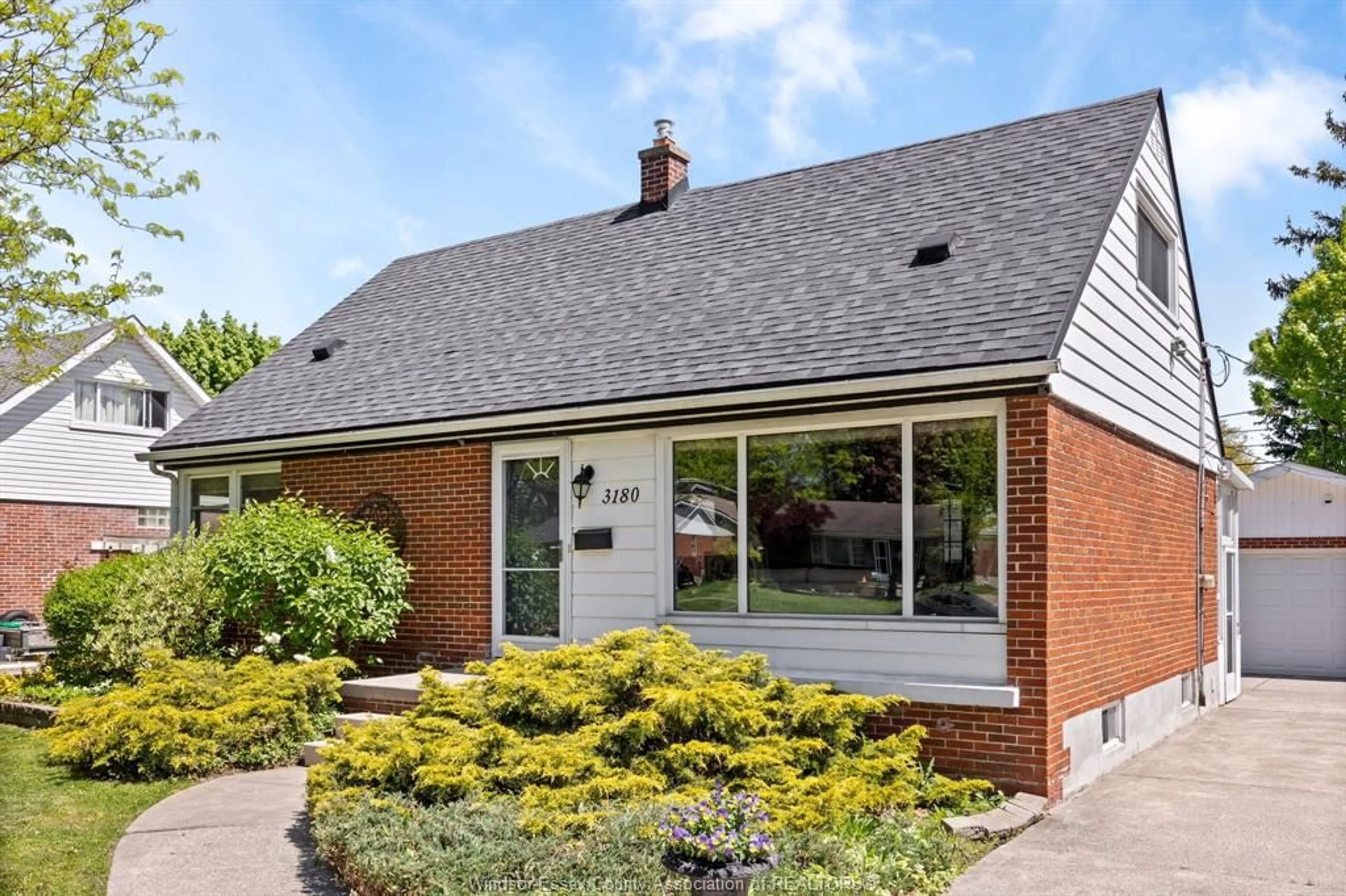 Home with brick exterior material, street for 3180 ACADEMY Dr, Windsor Ontario N9E 2H4
