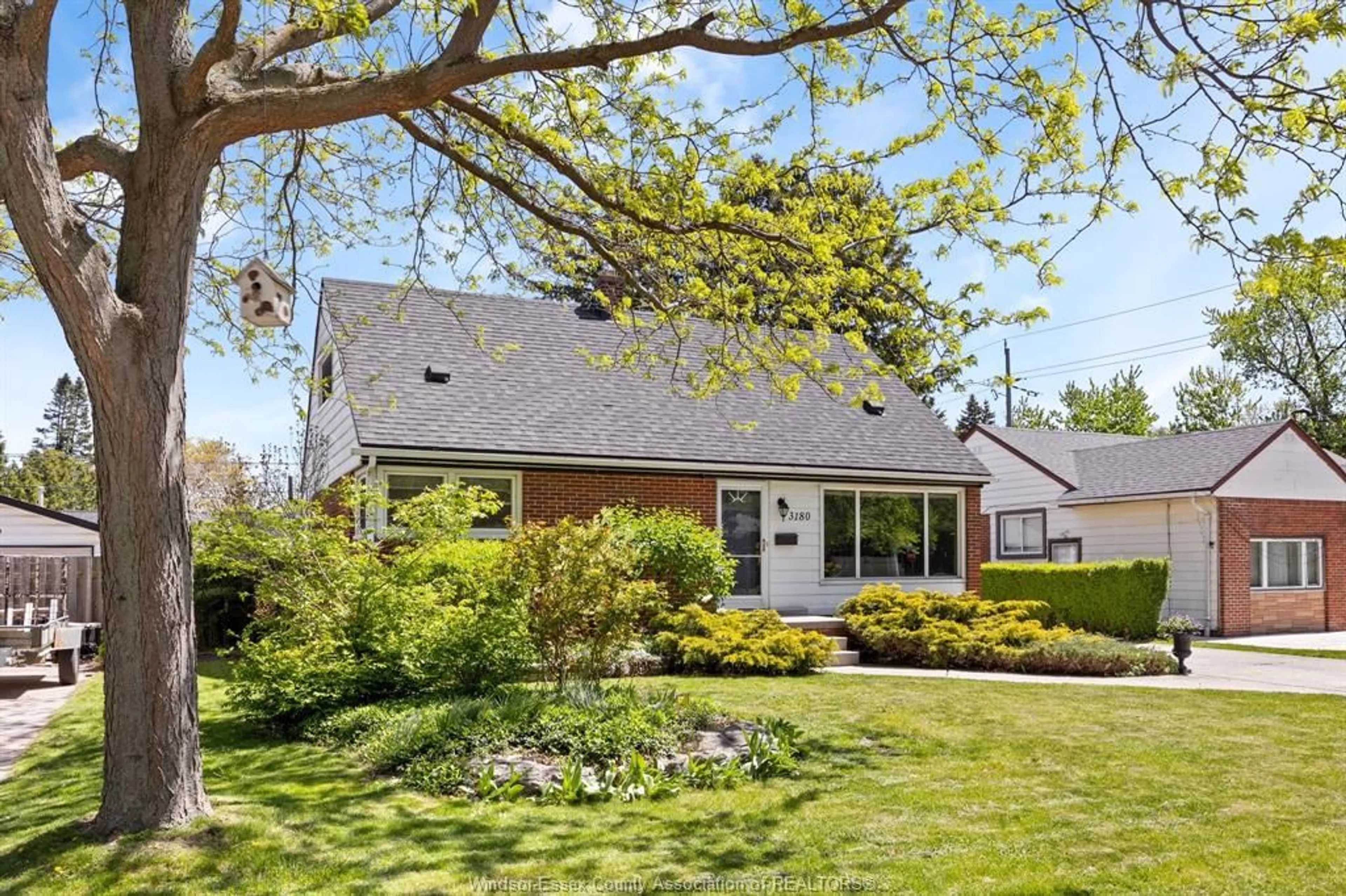 Home with brick exterior material, street for 3180 ACADEMY Dr, Windsor Ontario N9E 2H4