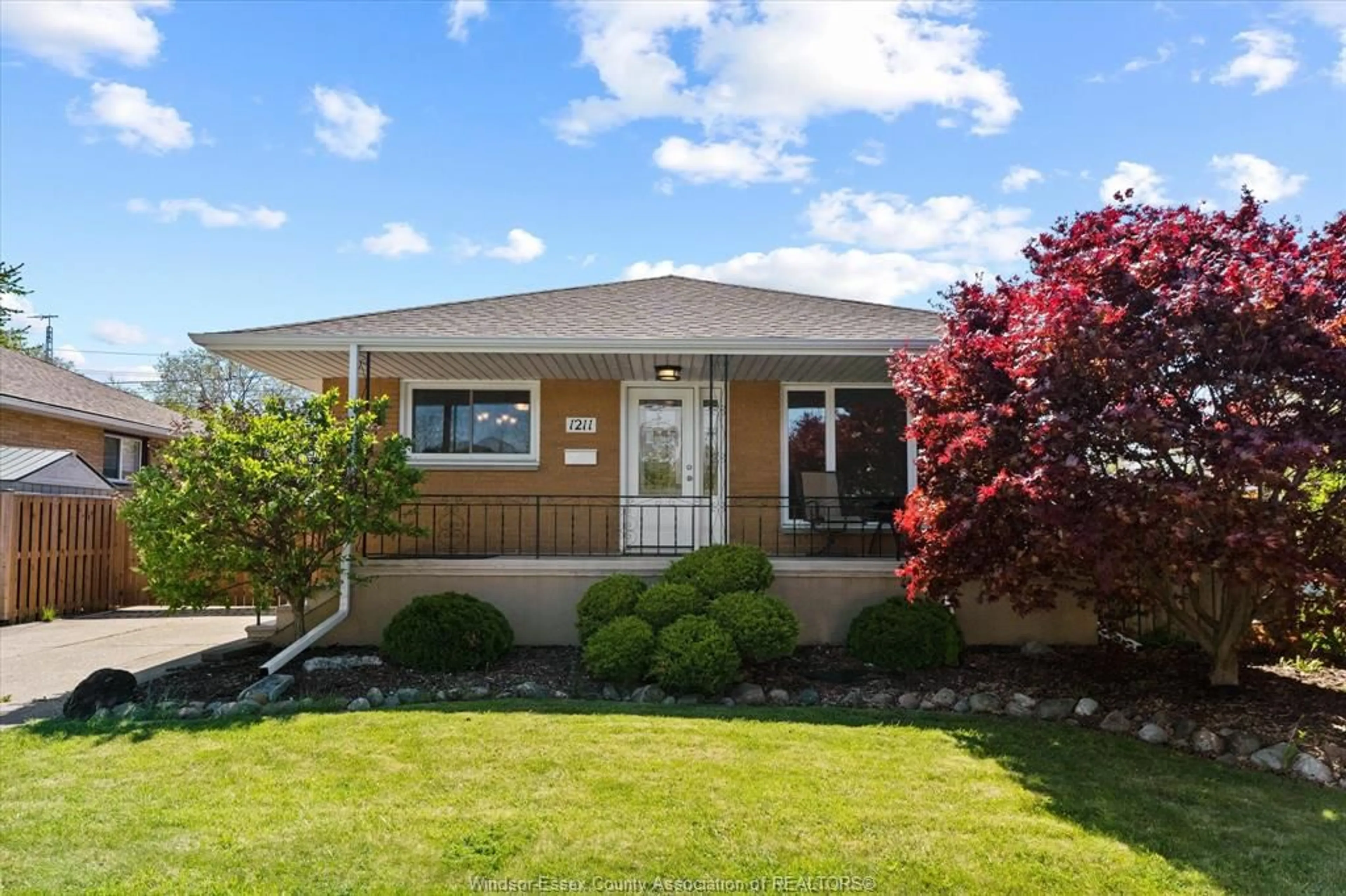 Home with vinyl exterior material, street for 1211 TOURANGEAU, Windsor Ontario N8Y 4H8