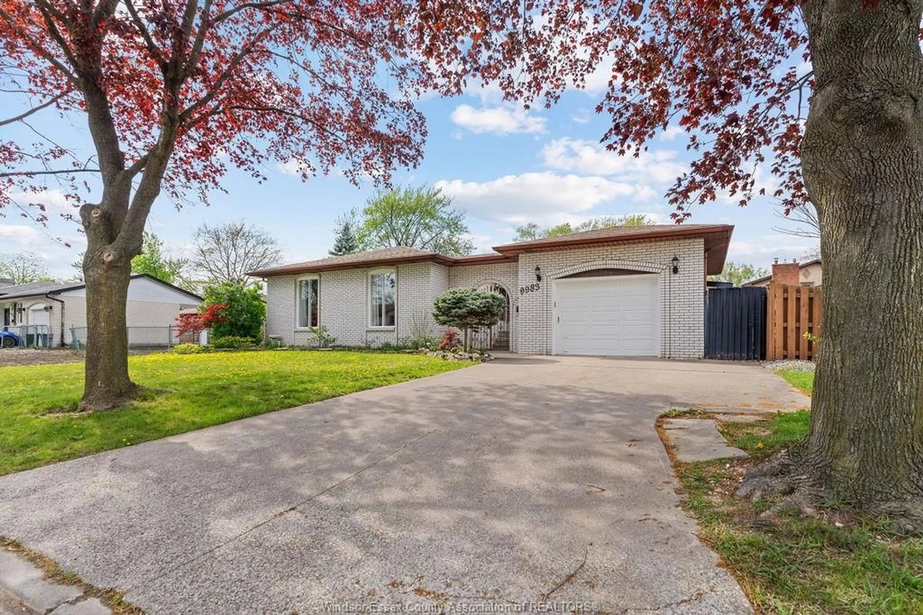 Home with vinyl exterior material, street for 9983 KENWOOD Cres, Windsor Ontario N8R 1H4