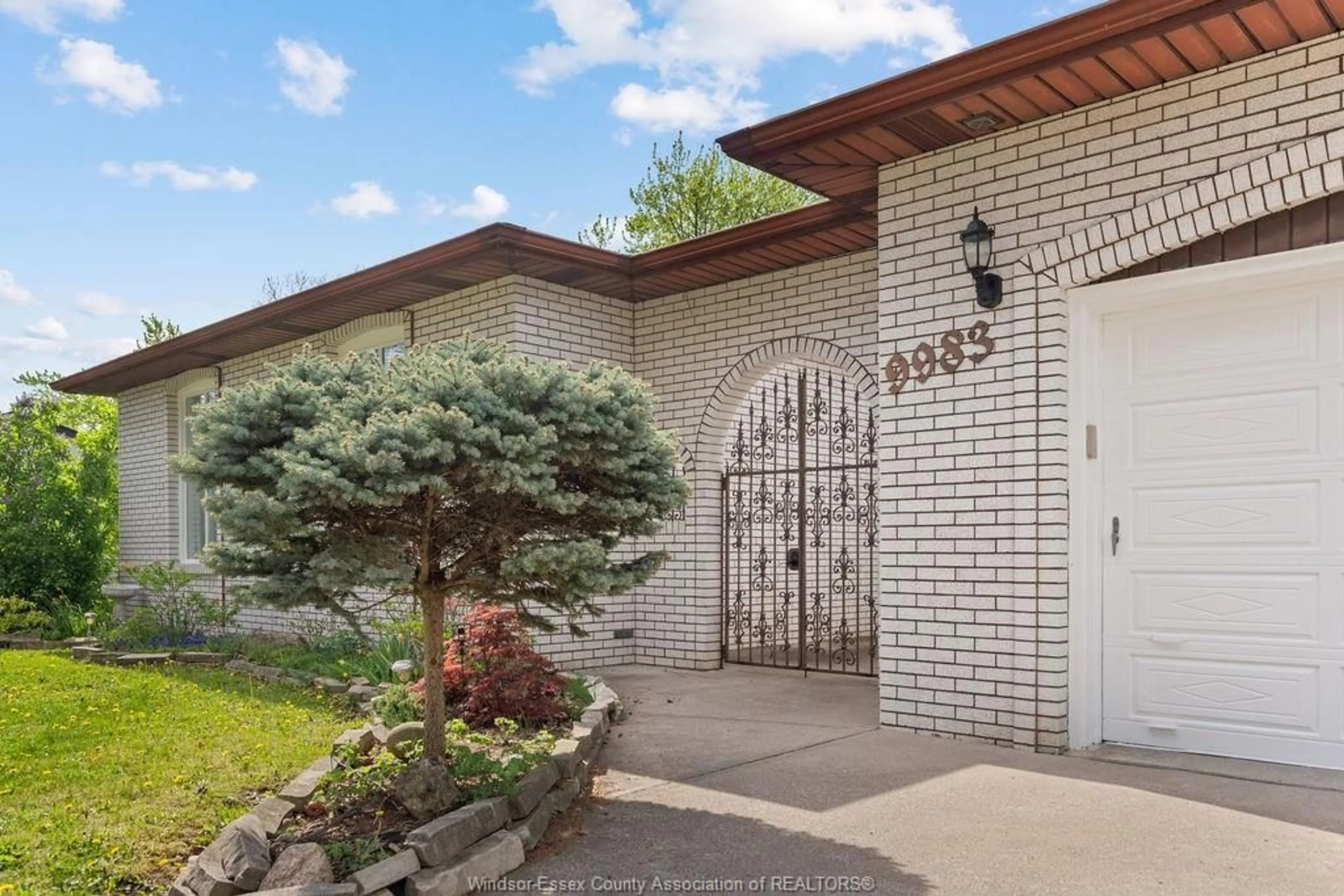 Home with brick exterior material, street for 9983 KENWOOD Cres, Windsor Ontario N8R 1H4