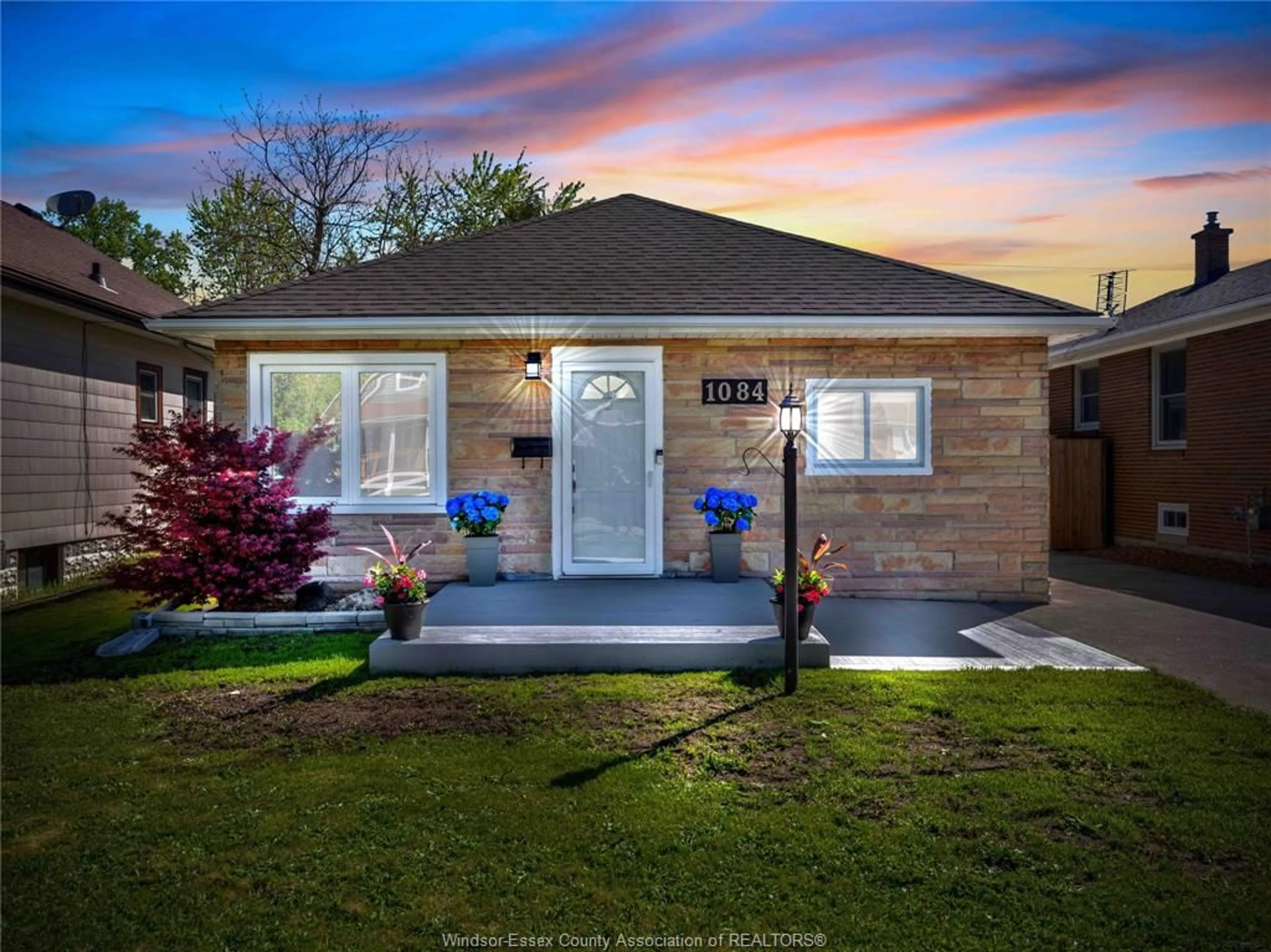 Home with brick exterior material, street for 1084 ESDRAS Pl, Windsor Ontario N8S 2N2