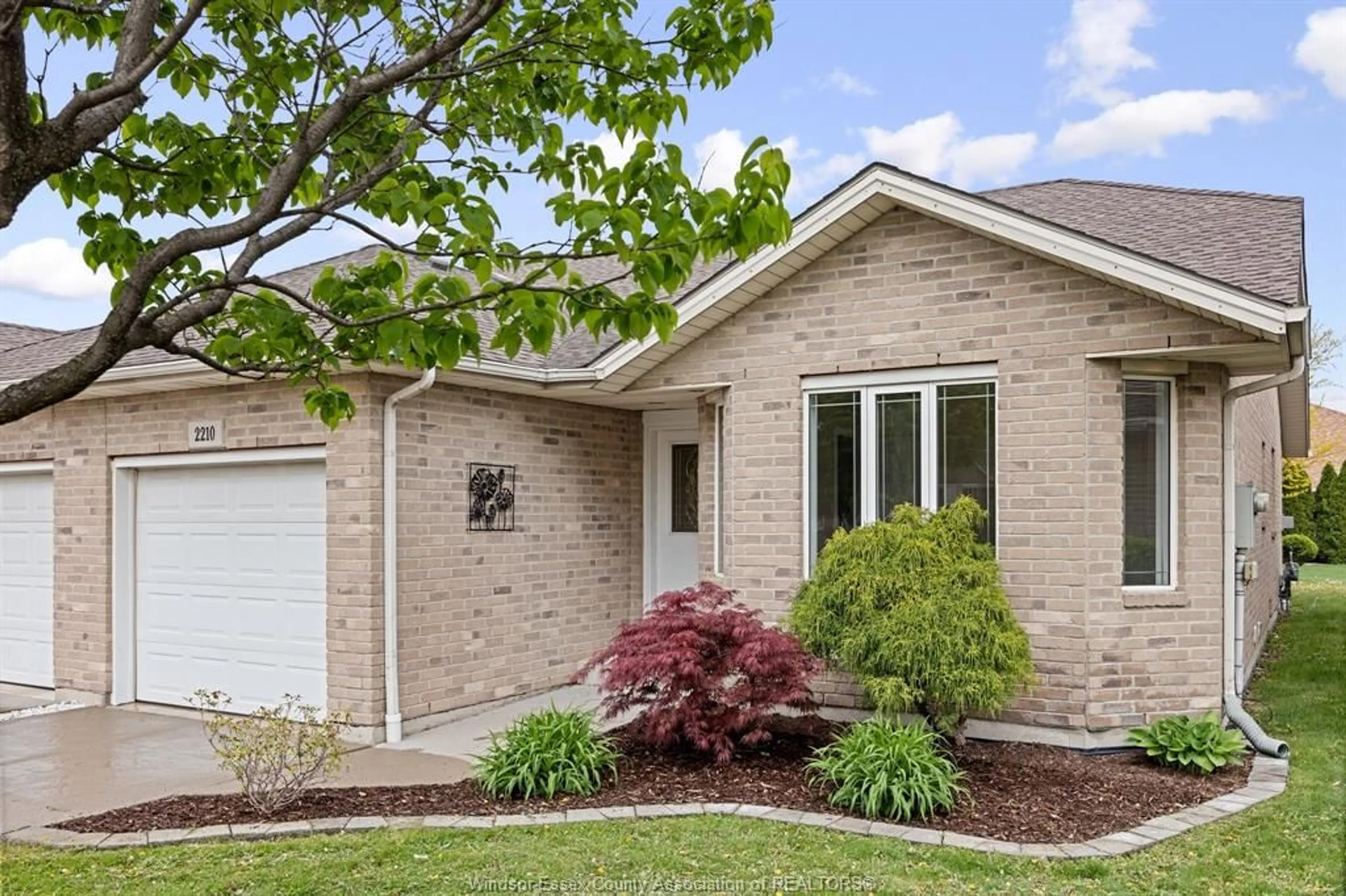 Home with brick exterior material, street for 2210 CLOVER, Windsor Ontario N8P 1W5