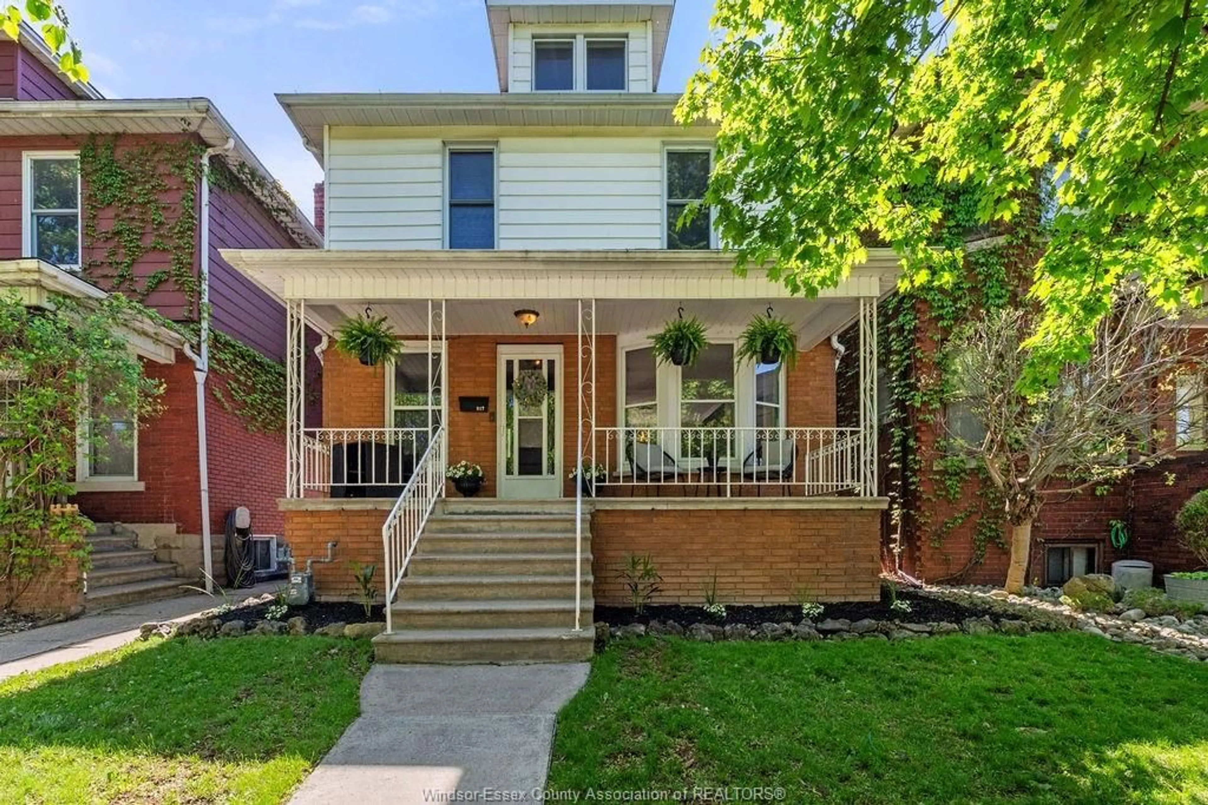 Home with brick exterior material, street for 917 WINDERMERE Rd, Windsor Ontario N8Y 3E5