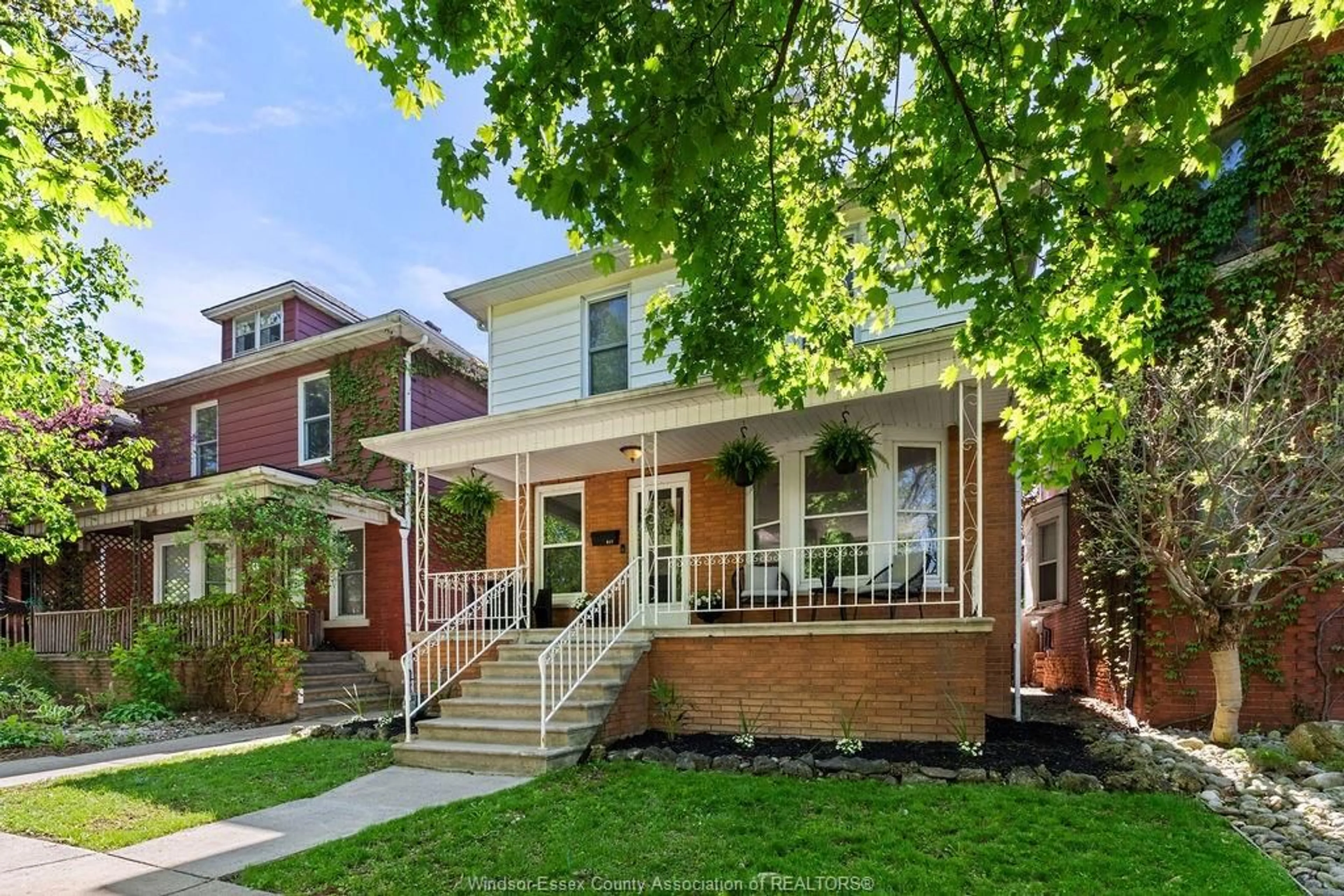 Home with brick exterior material, street for 917 WINDERMERE Rd, Windsor Ontario N8Y 3E5