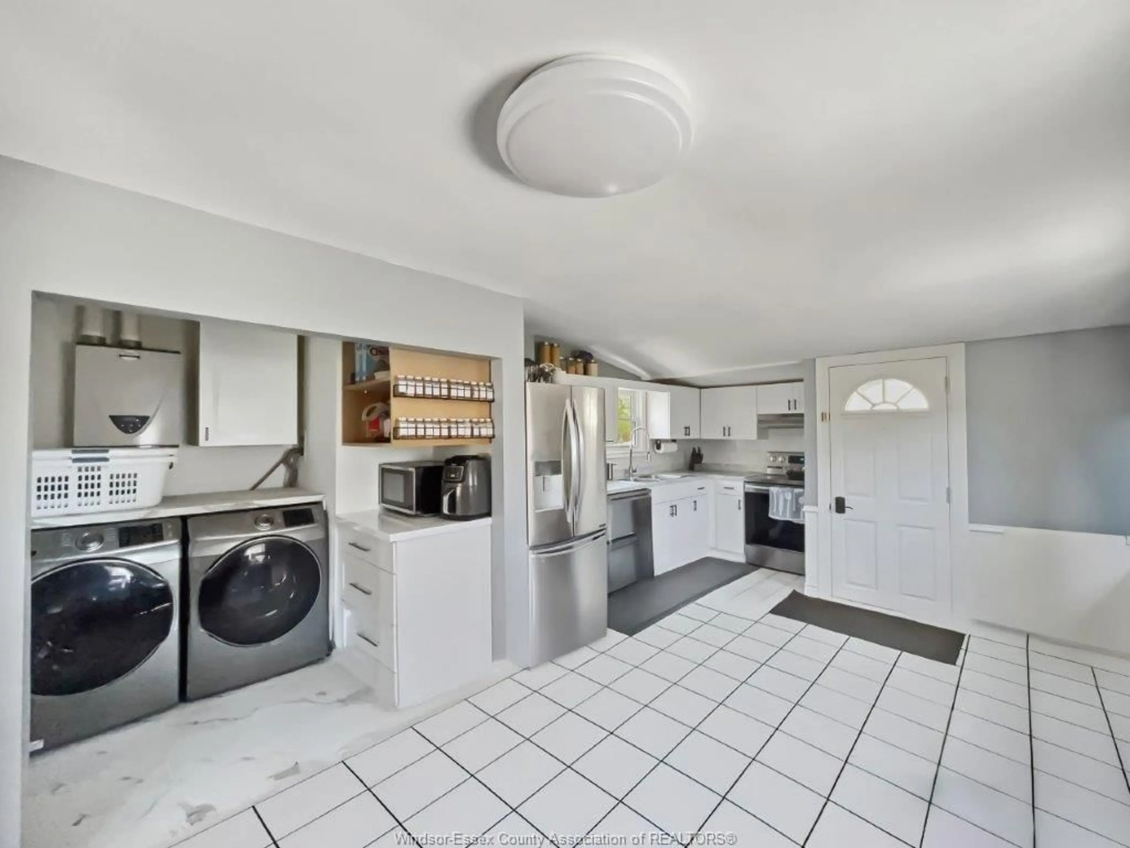 Kitchen with laundary machines, ceramic/tile floor for 650 ST. PIERRE St, Tecumseh Ontario N8N 1Z4