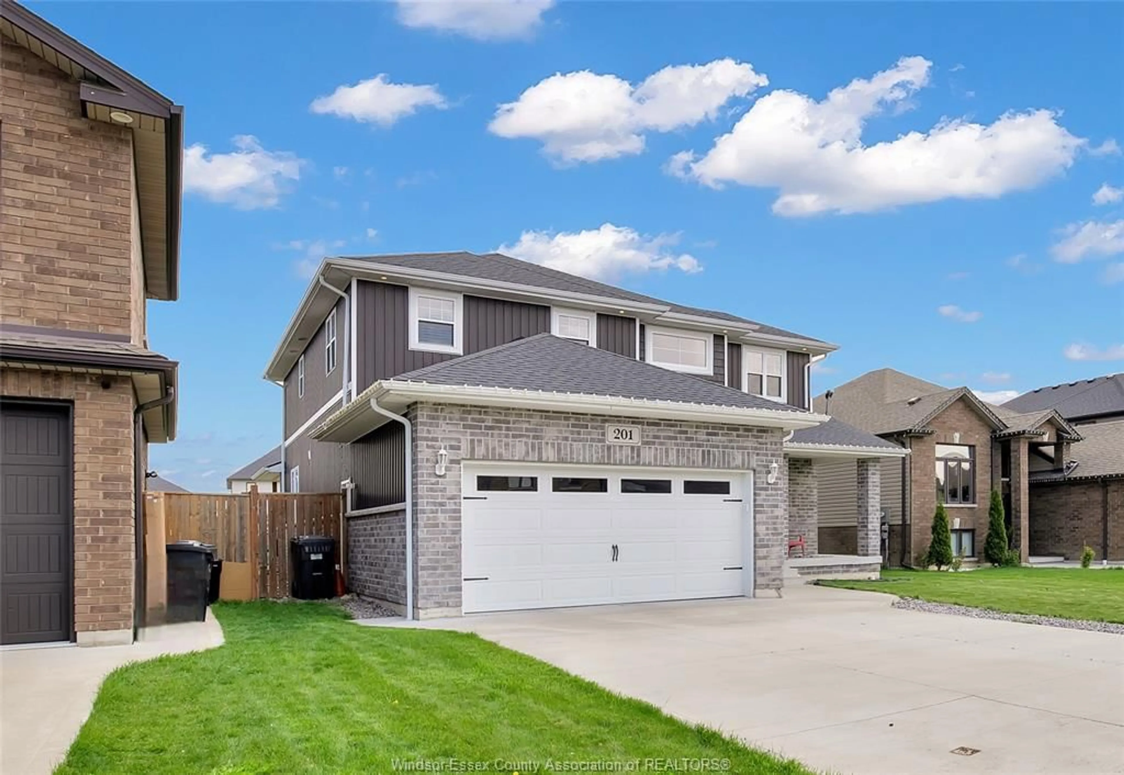 Home with vinyl exterior material, street for 201 SUMMER St, Belle River Ontario N0R 1A0