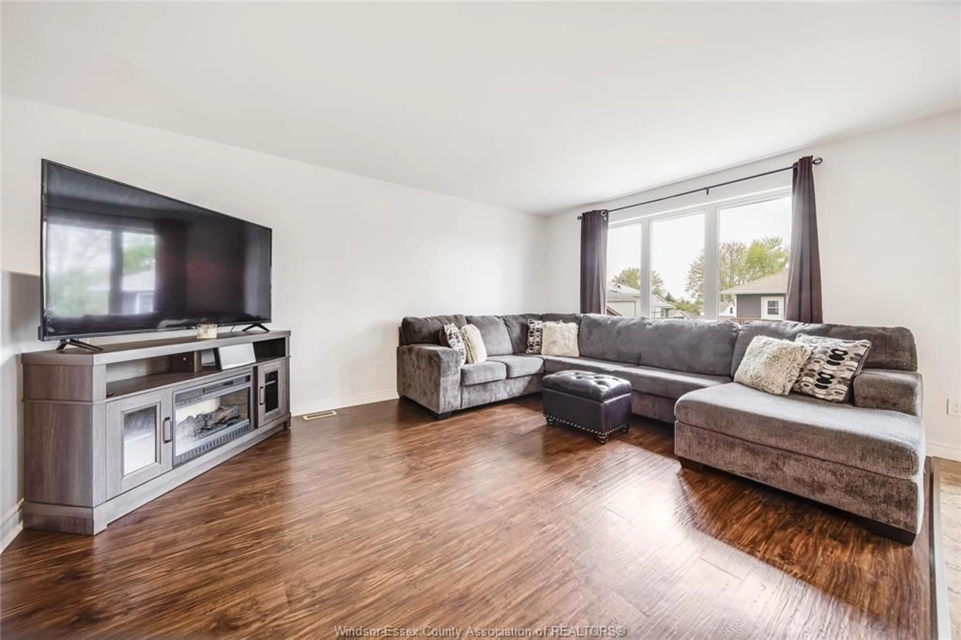 Living room with furniture, wood/laminate floor for 113 ANGER St, Blenheim Ontario N0P 1A0