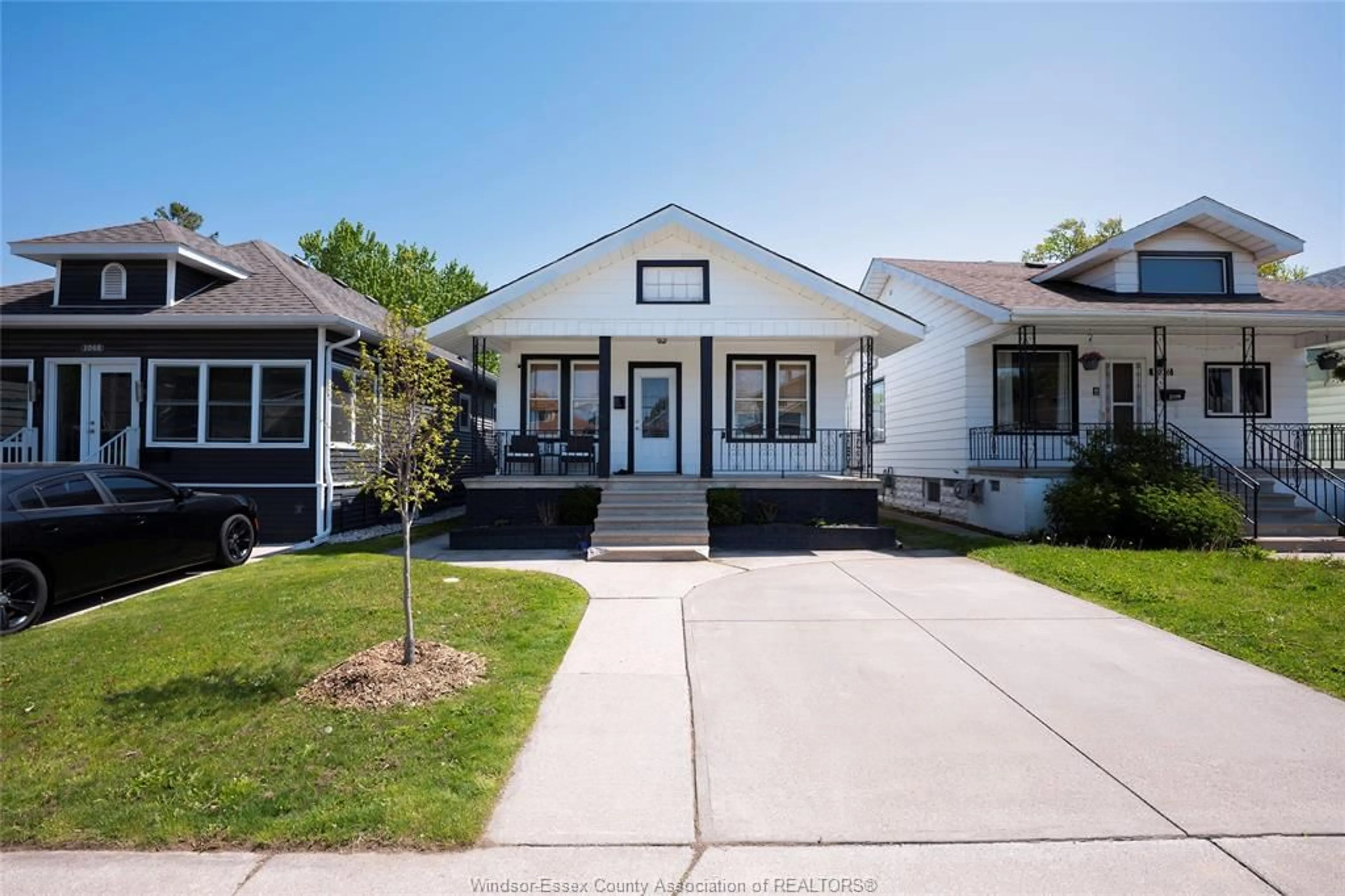 Home with vinyl exterior material, street for 1072 ELM Ave, Windsor Ontario N9A 5H7