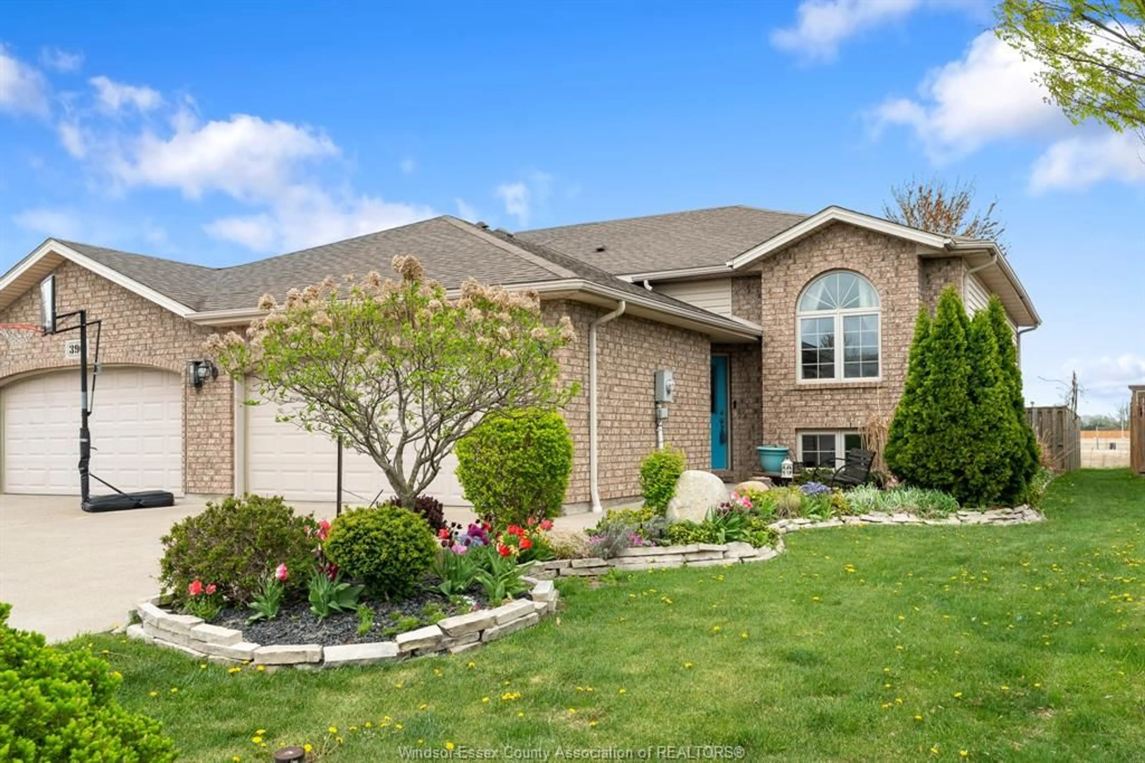 Home with brick exterior material, street for 388 ROSEWOOD Dr, Lakeshore Ontario N0R 1A7