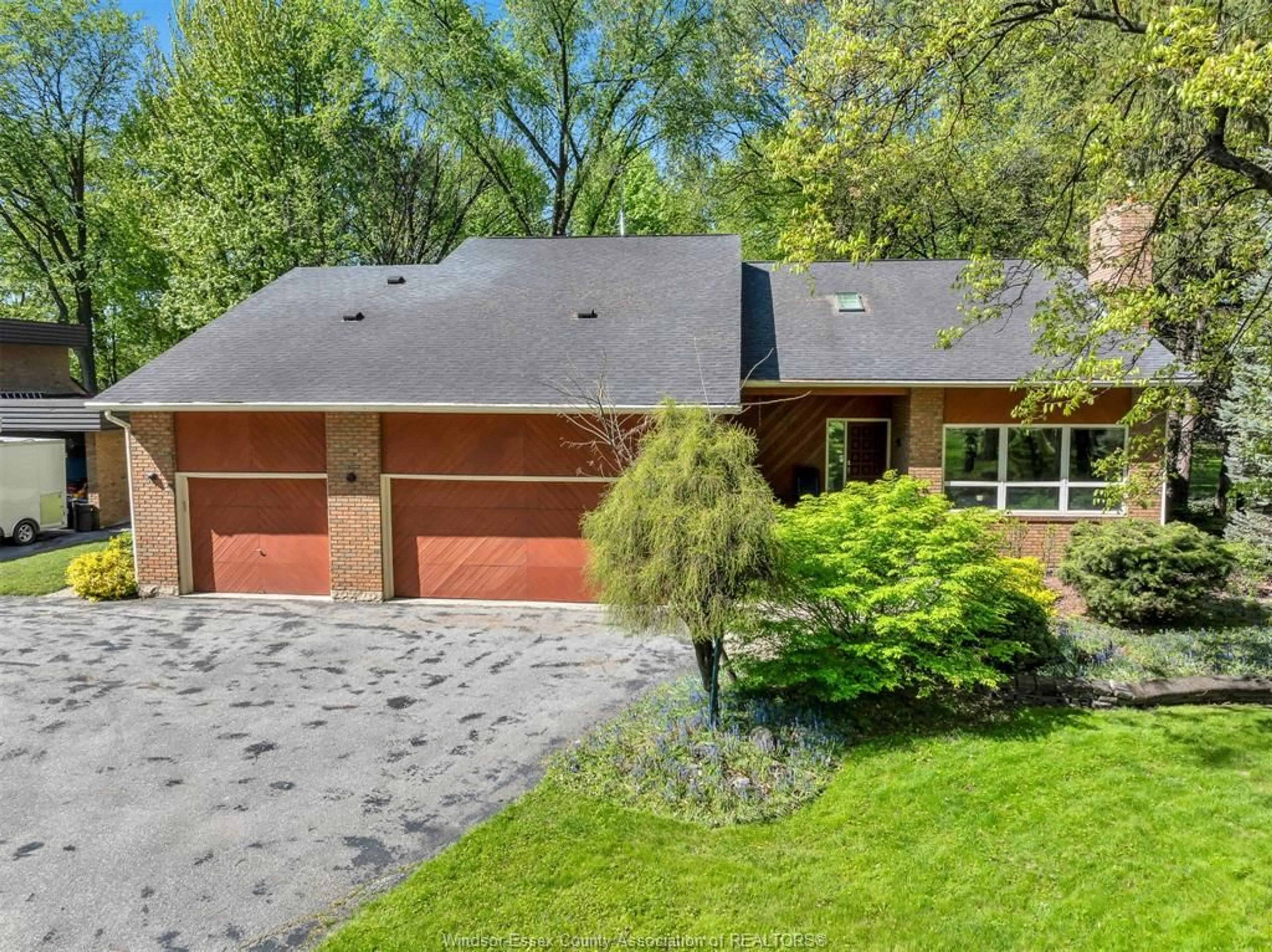 Home with brick exterior material, street for 400 OLD TECUMSEH, Lakeshore Ontario N8N 3S8