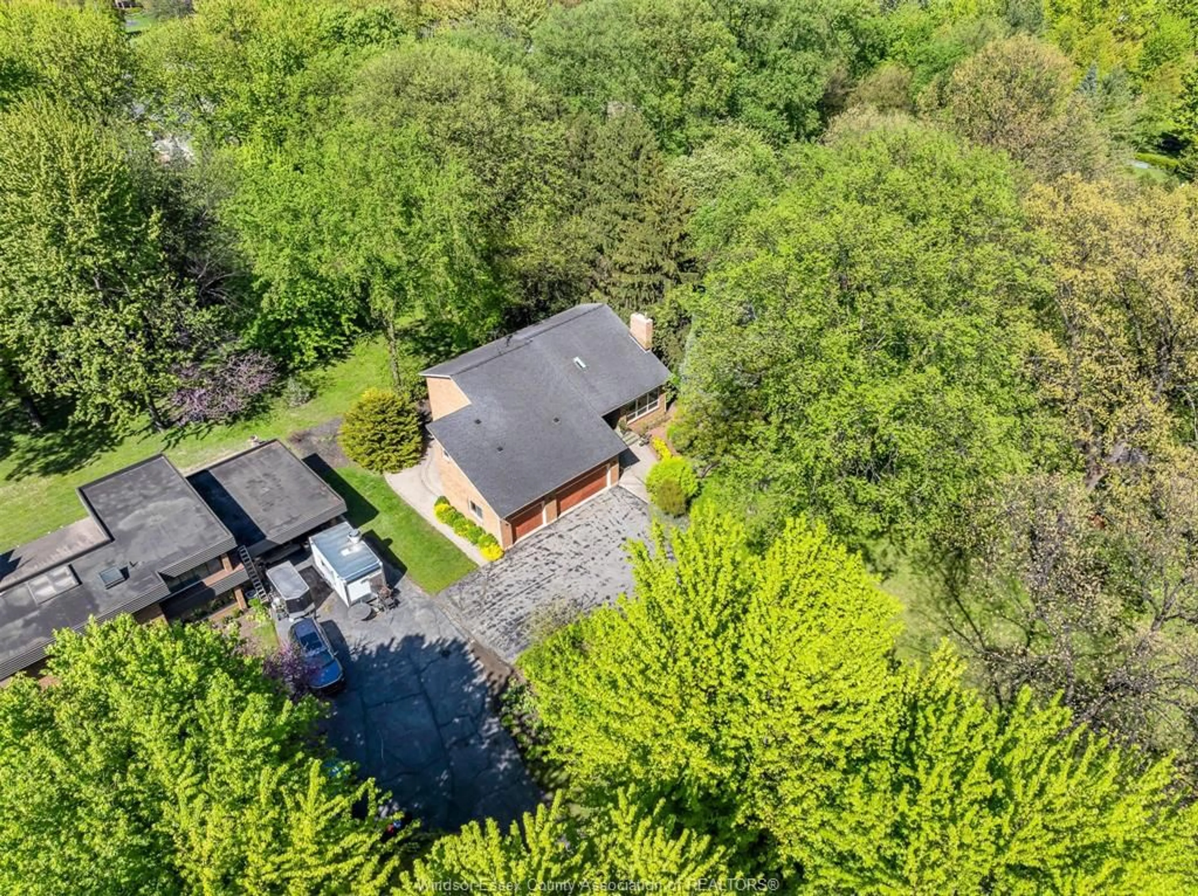 A pic from outside/outdoor area/front of a property/back of a property/a pic from drone, forest/trees view for 400 OLD TECUMSEH, Lakeshore Ontario N8N 3S8