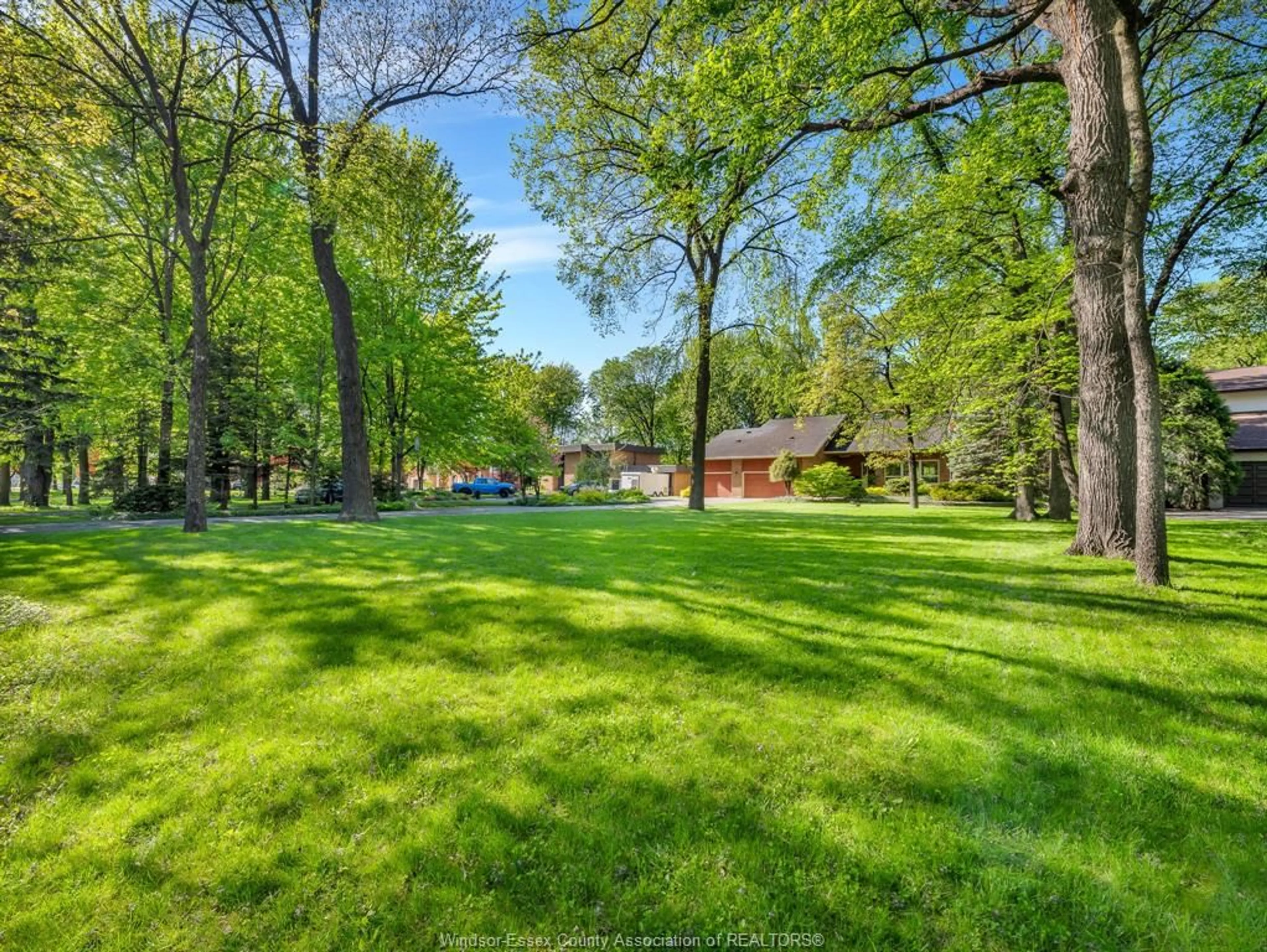 A pic from outside/outdoor area/front of a property/back of a property/a pic from drone, forest/trees view for 400 OLD TECUMSEH, Lakeshore Ontario N8N 3S8