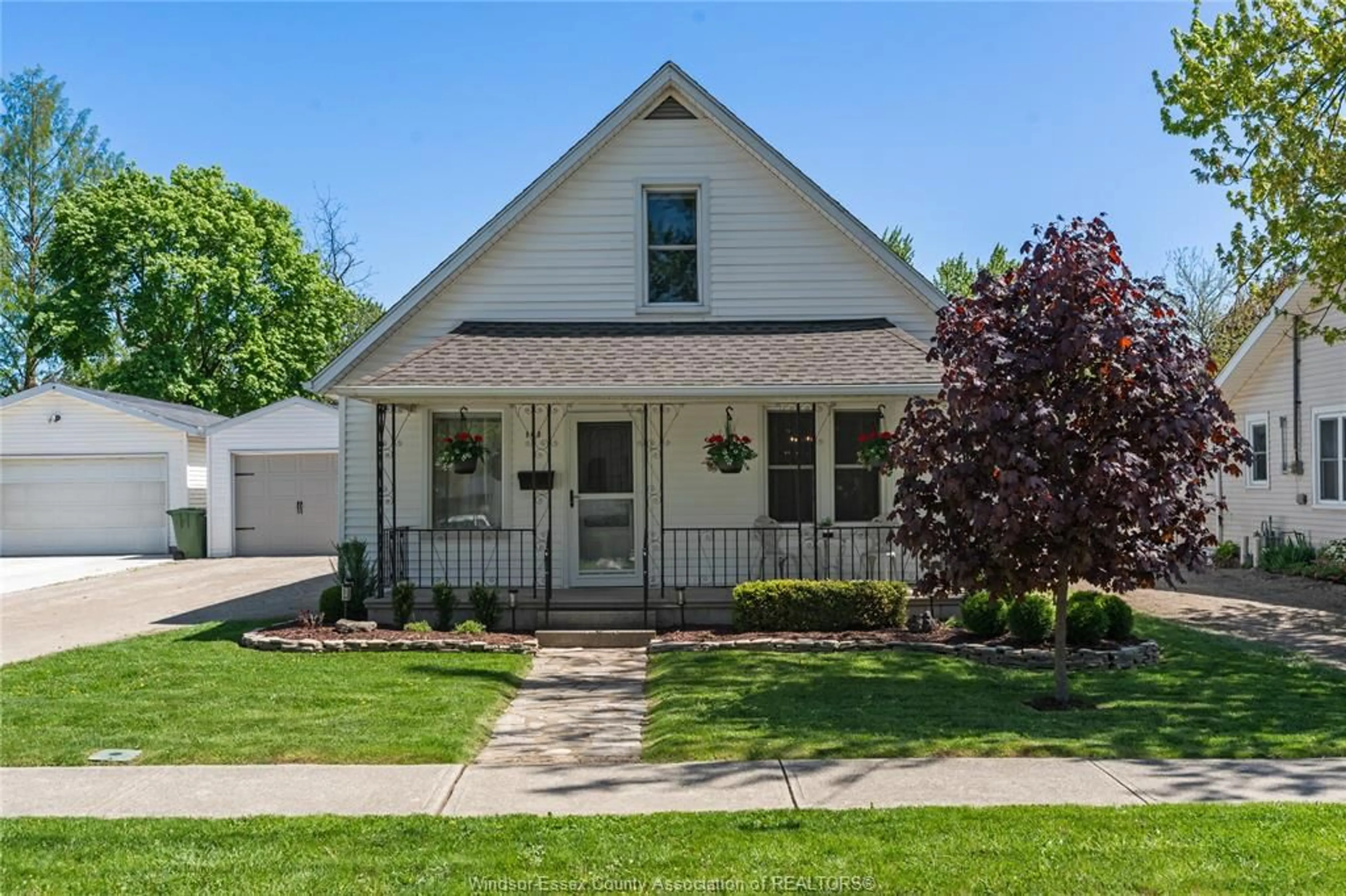 Home with vinyl exterior material, street for 103 ST. JAMES, Essex Ontario N8M 1E5