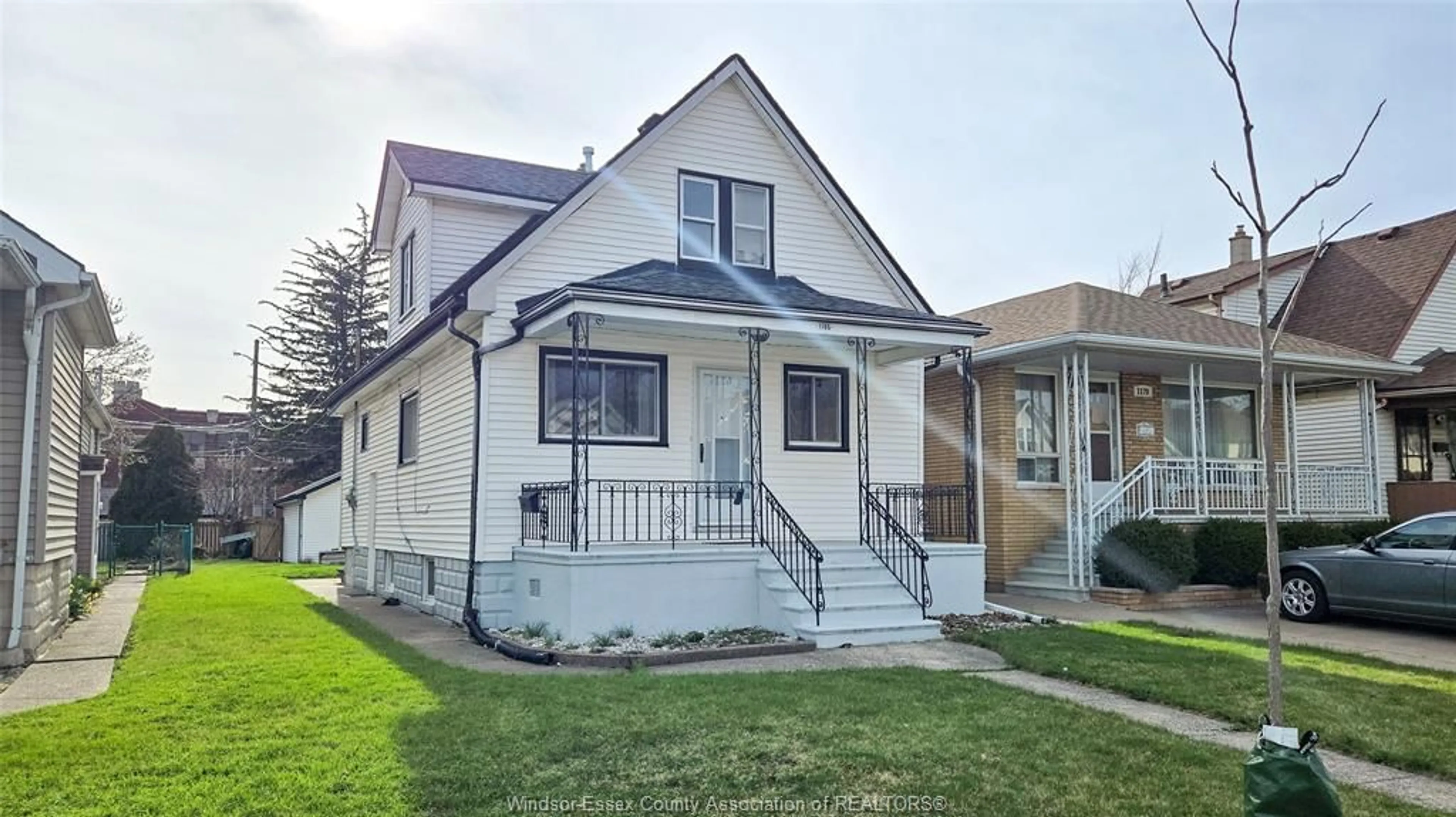 Home with vinyl exterior material, street for 1185 LANGLOIS Ave, Windsor Ontario N9A 2H4