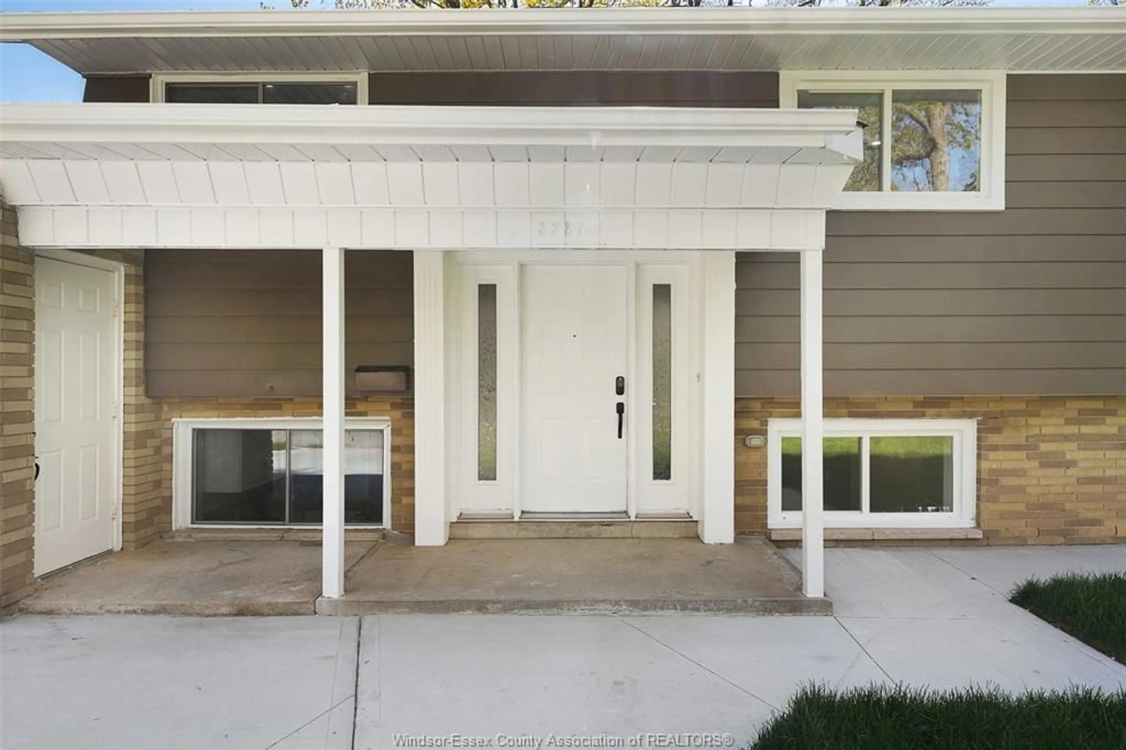 Home with vinyl exterior material, street for 3387 RANDOLPH Ave, Windsor Ontario N9E 3E8