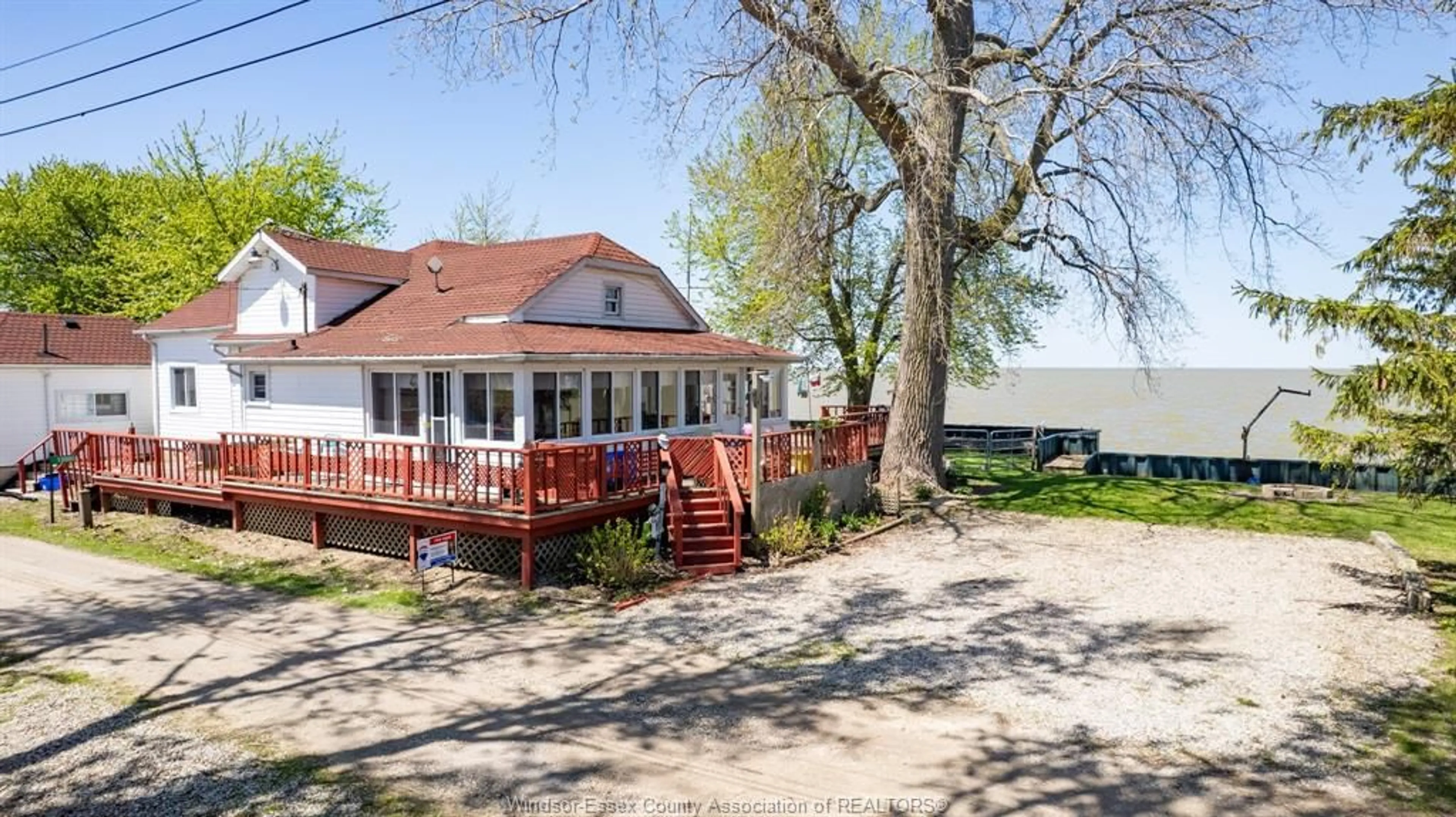 A pic from outside/outdoor area/front of a property/back of a property/a pic from drone, street for 13980 CRYSTAL BEACH Rd, Lakeshore Ontario N0R 1N0