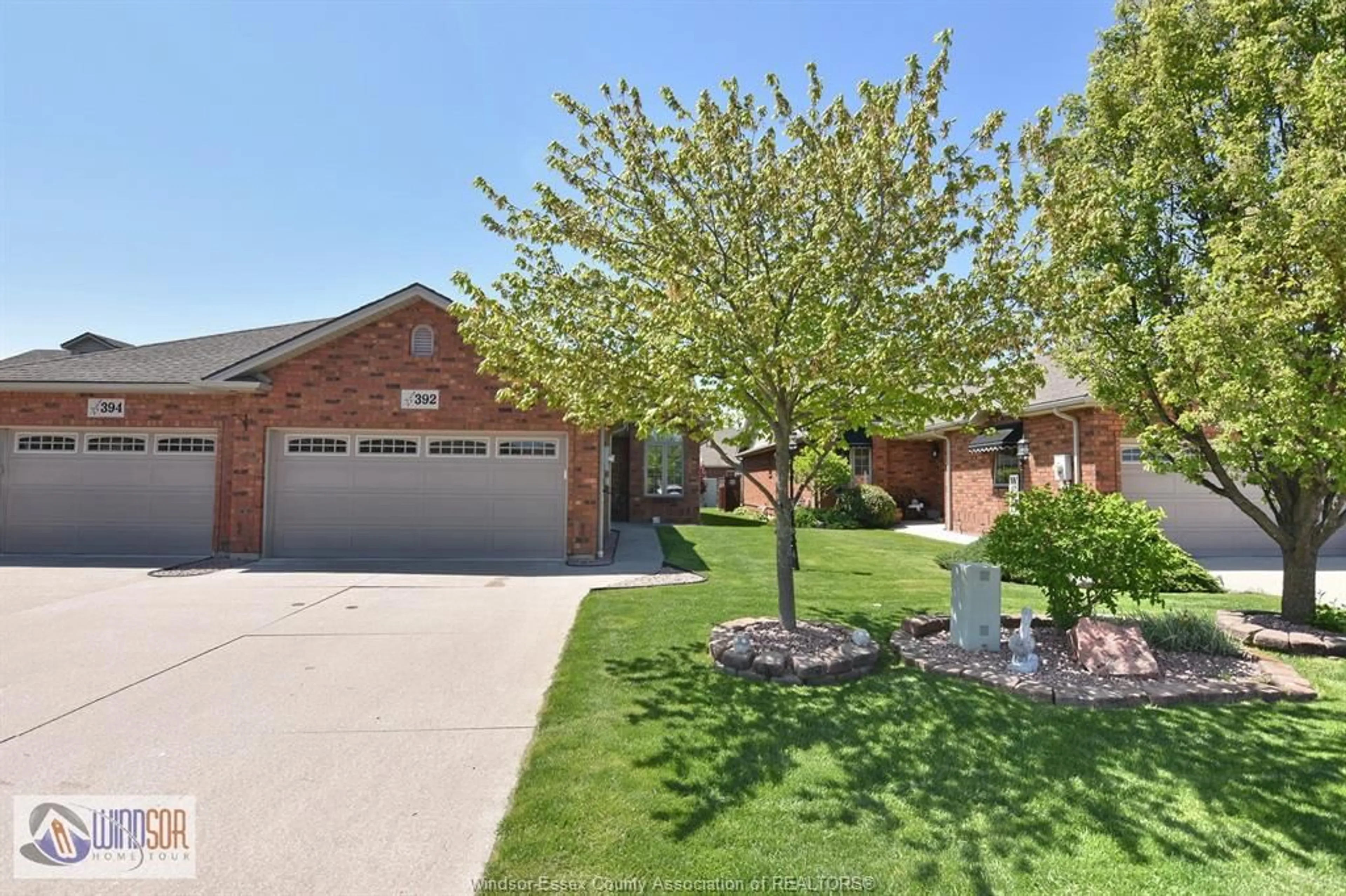 Home with brick exterior material, street for 392 MILLSTONE Lane, Lakeshore Ontario N0R 1A0