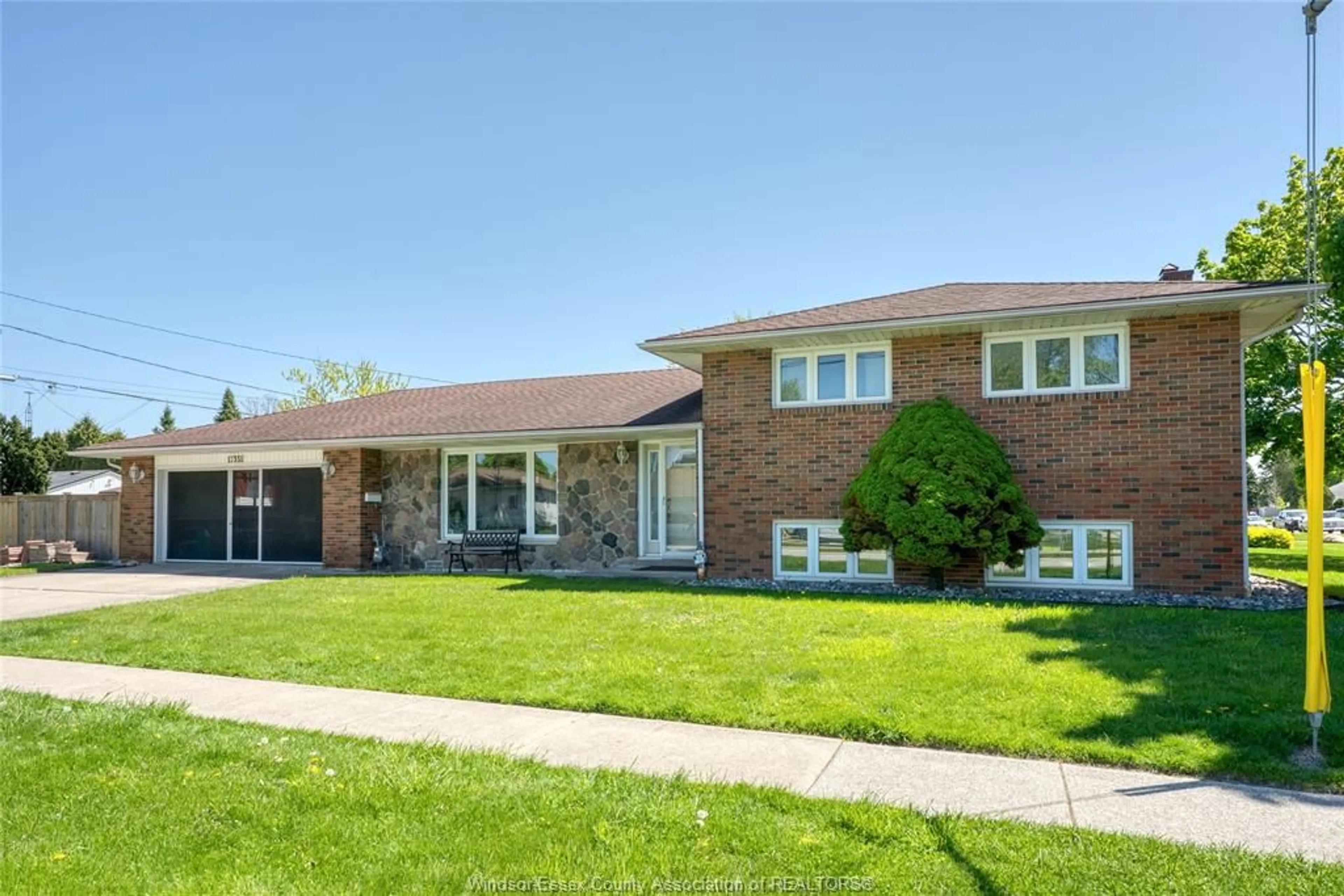 Home with brick exterior material, street for 12351 CLAPP St, Tecumseh Ontario N8N 1H2
