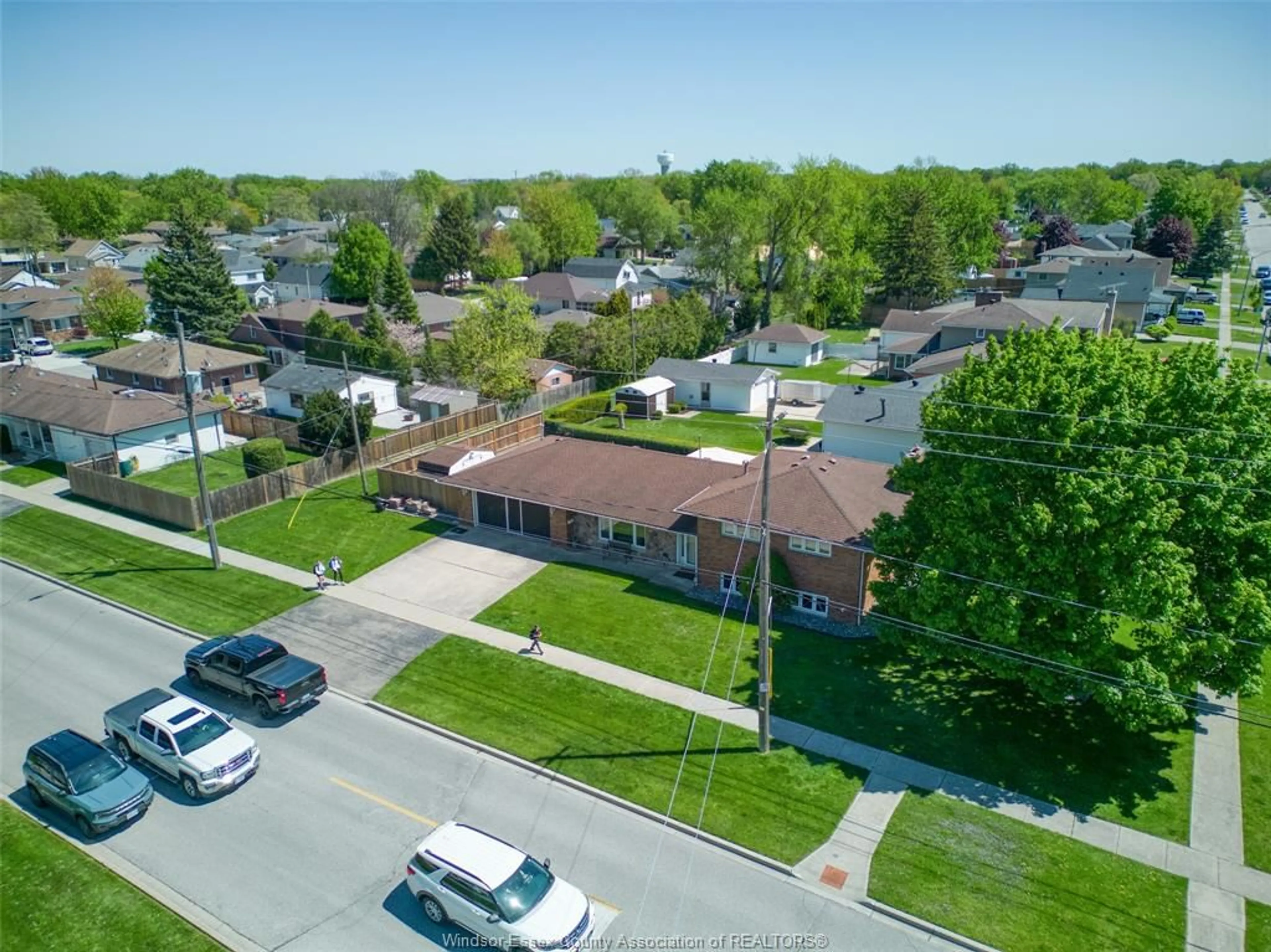 A pic from outside/outdoor area/front of a property/back of a property/a pic from drone, street for 12351 CLAPP St, Tecumseh Ontario N8N 1H2
