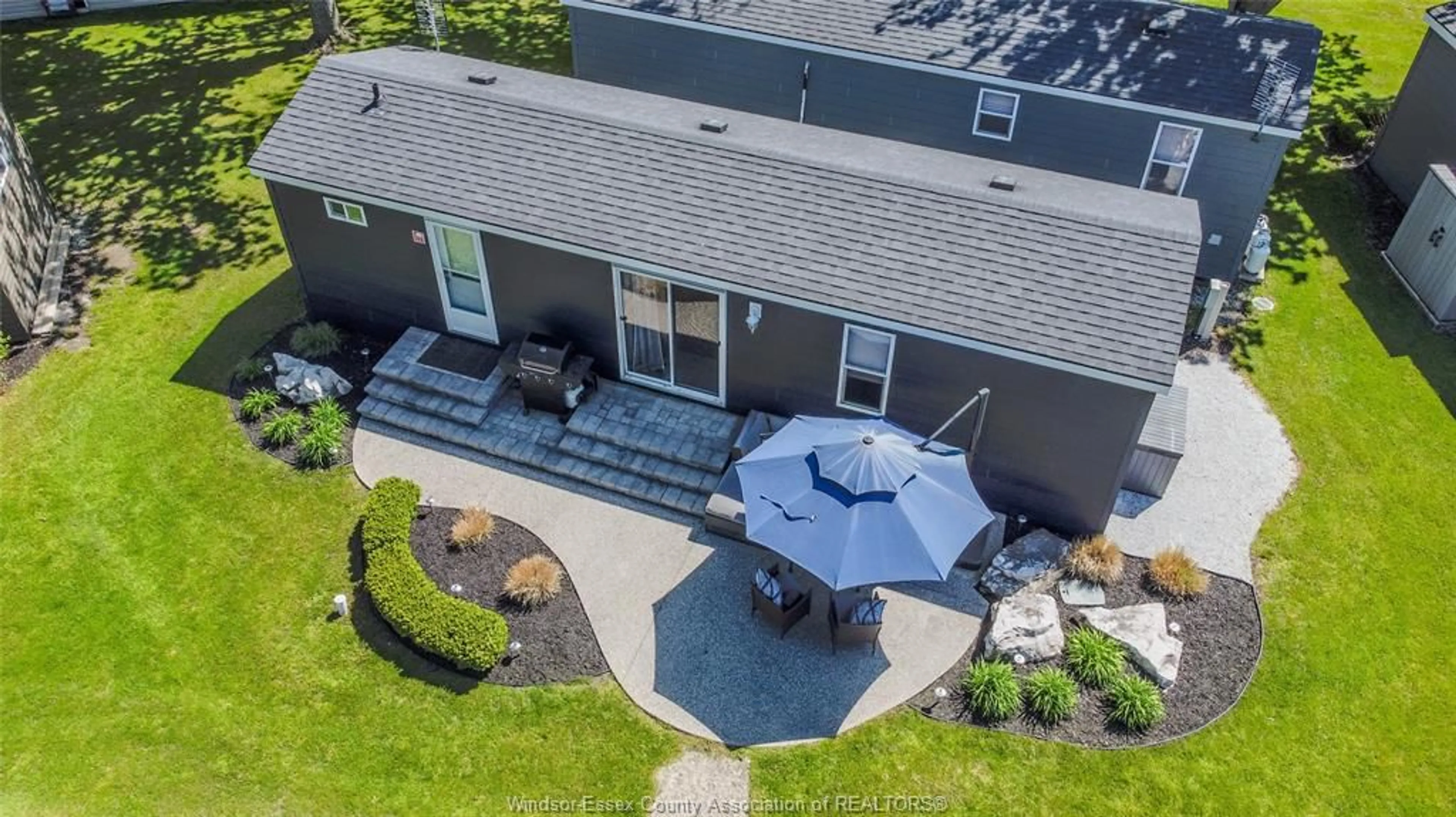 A pic from outside/outdoor area/front of a property/back of a property/a pic from drone, unknown for 981 COUNTY ROAD 2 #537, Lakeshore Ontario N0R 1A0