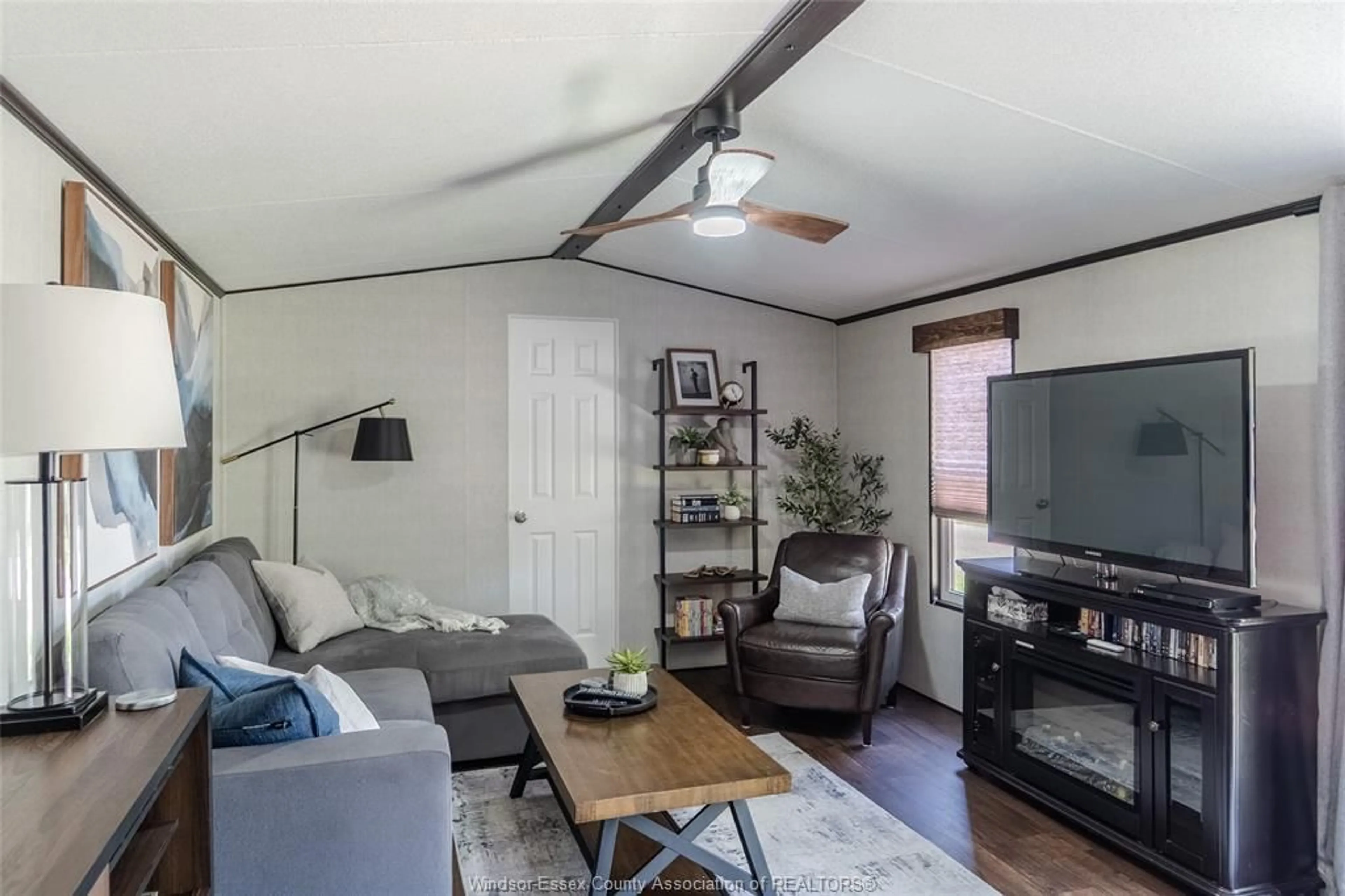 Living room with furniture, wood/laminate floor for 981 COUNTY ROAD 2 #537, Lakeshore Ontario N0R 1A0