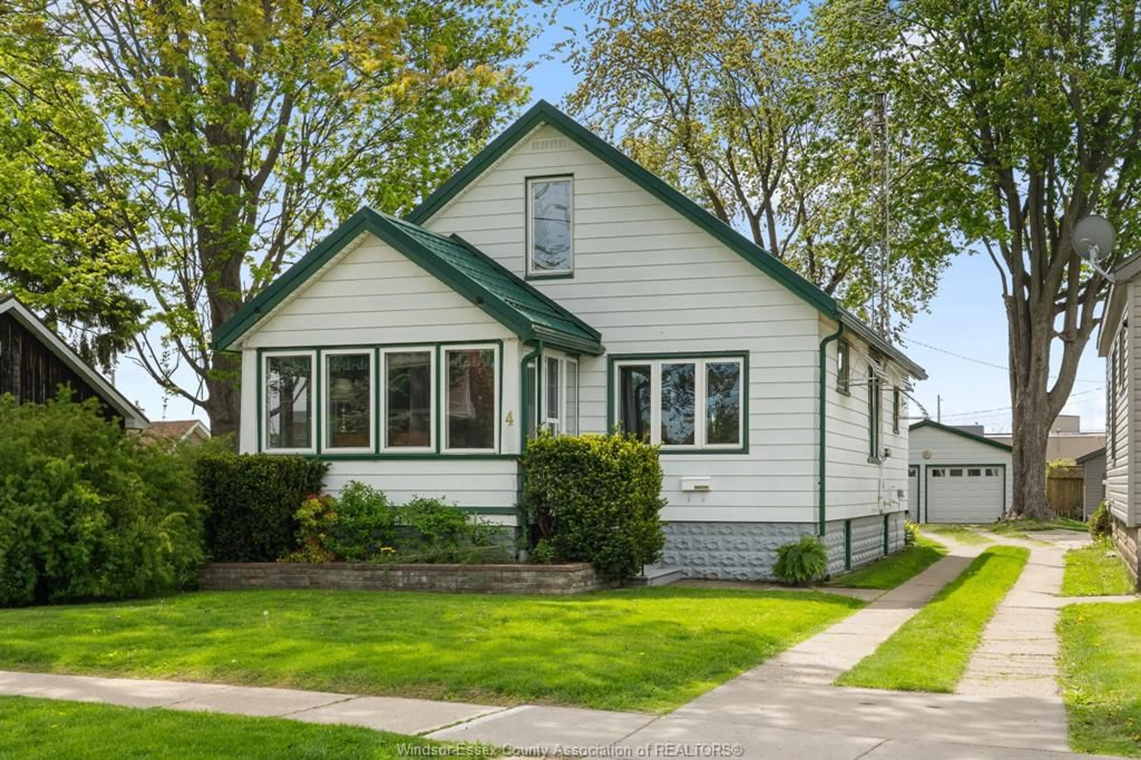 Home with vinyl exterior material, street for 4 Selkirk Ave, Leamington Ontario N8H 1G3