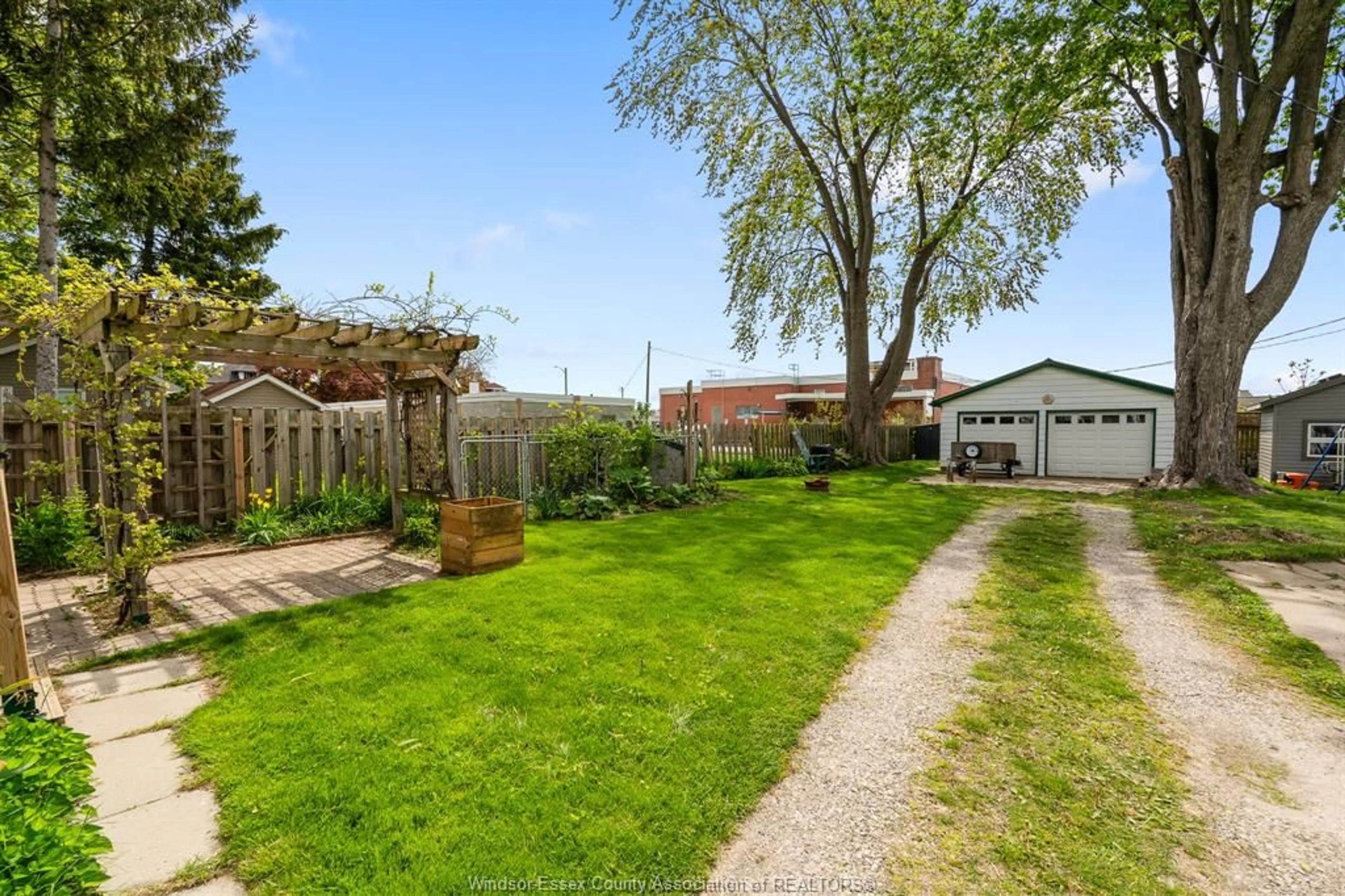 A pic from outside/outdoor area/front of a property/back of a property/a pic from drone, street for 4 Selkirk Ave, Leamington Ontario N8H 1G3