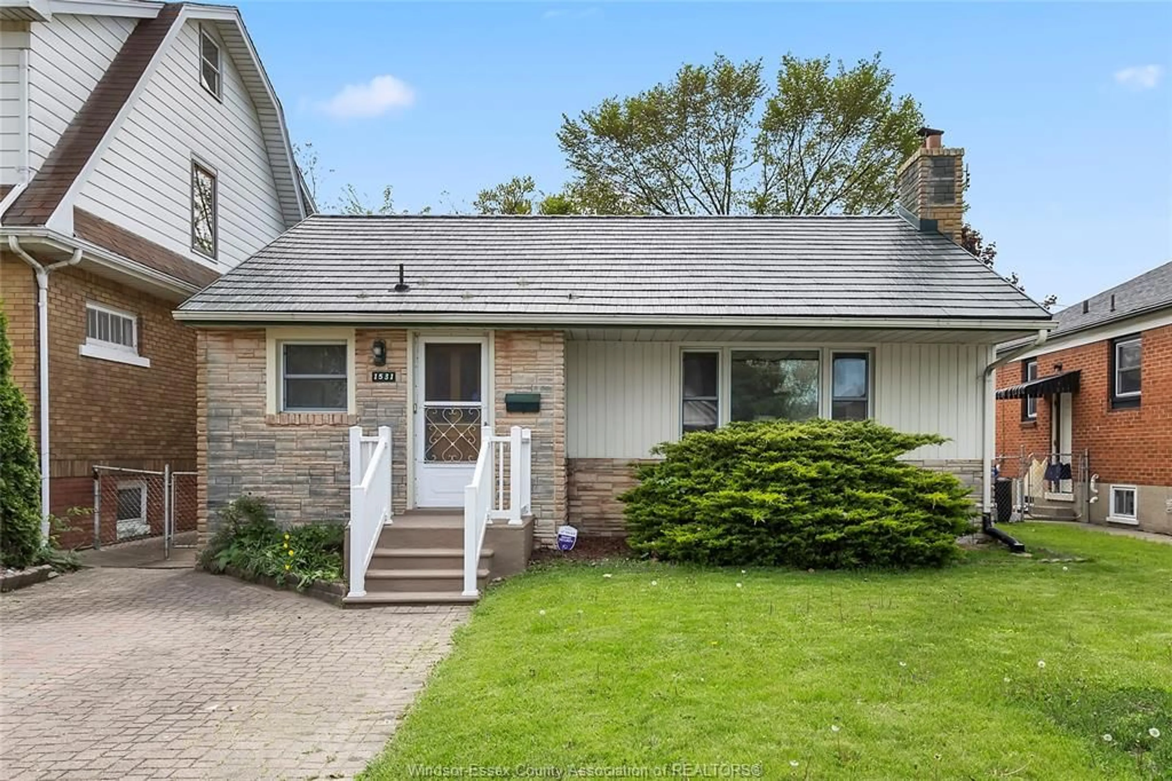 Home with vinyl exterior material, street for 1531 PILLETTE Rd, Windsor Ontario N8Y 3C3