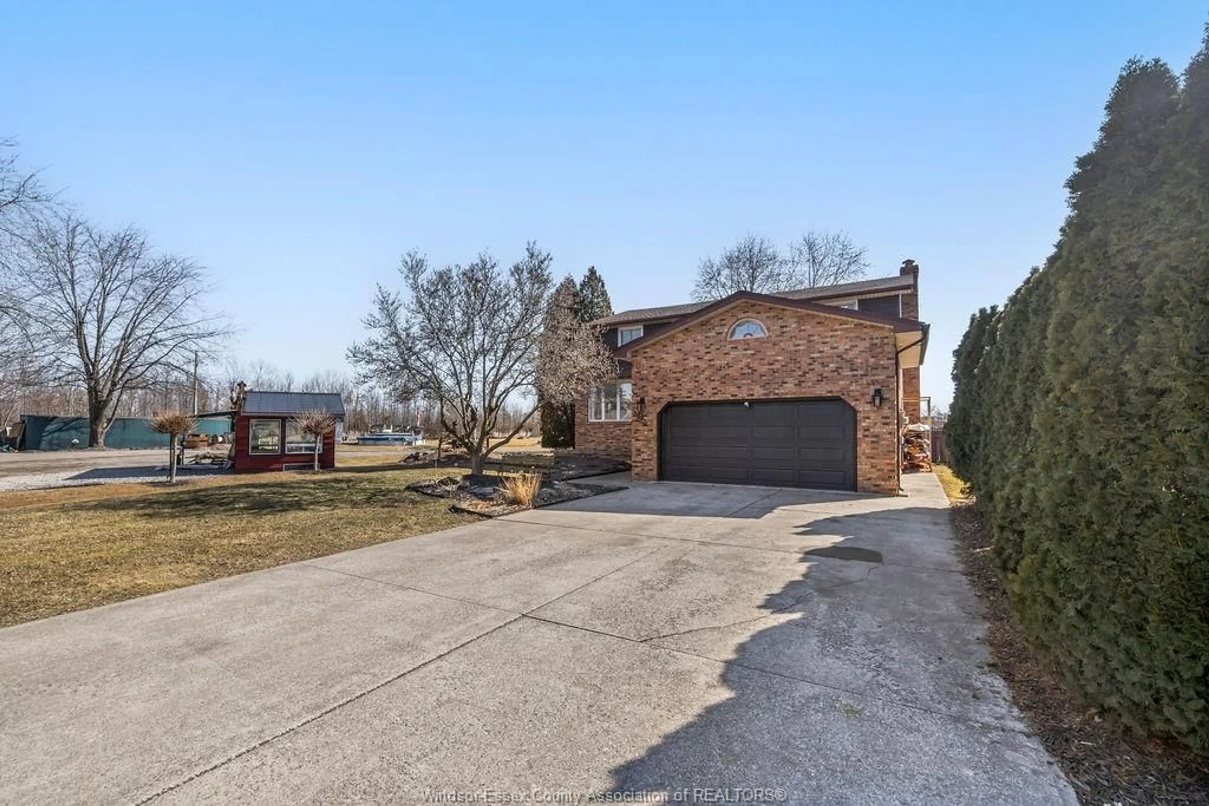 A pic from outside/outdoor area/front of a property/back of a property/a pic from drone, street for 2993 FRONT Rd, LaSalle Ontario N9J 2P1