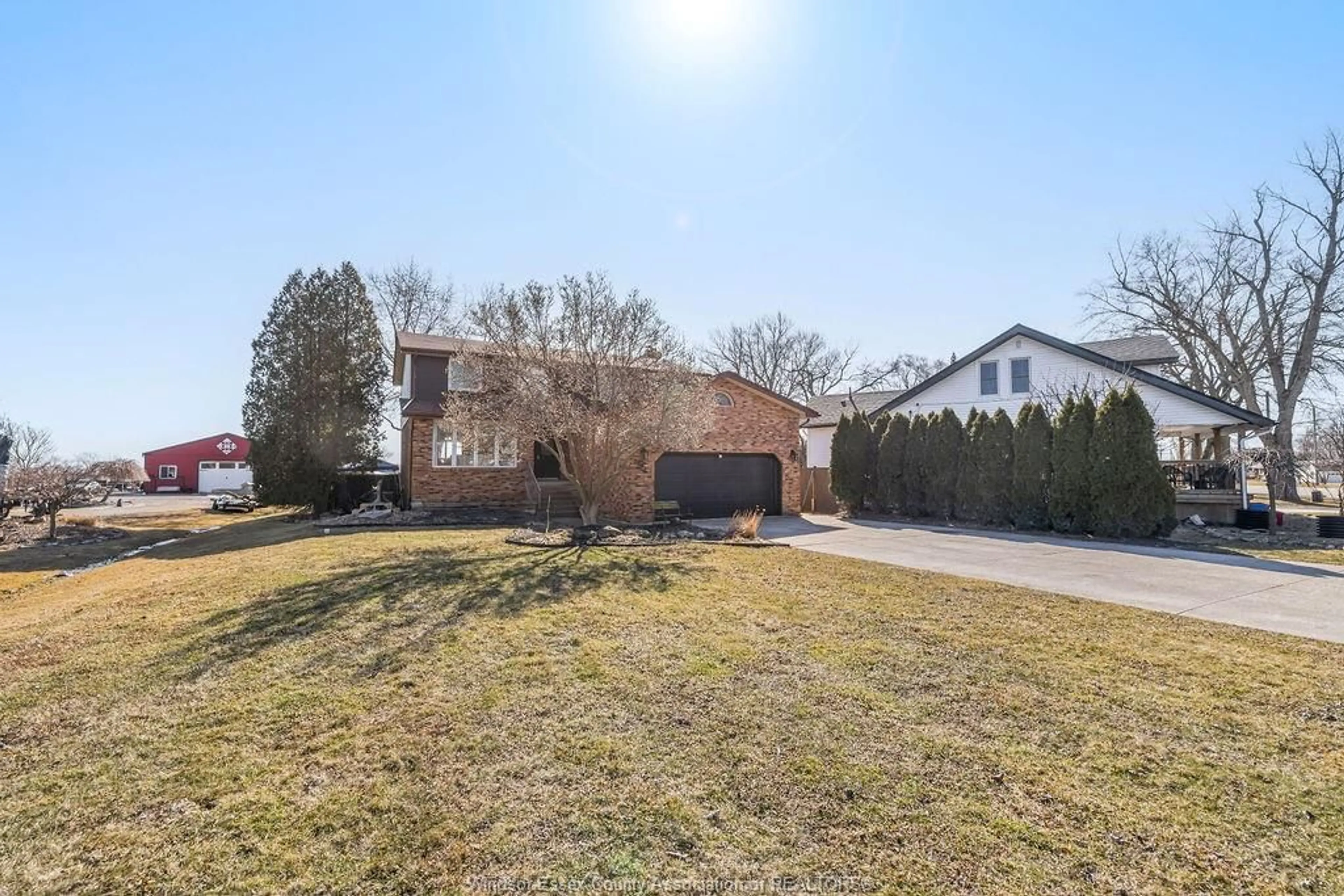 A pic from outside/outdoor area/front of a property/back of a property/a pic from drone, street for 2993 FRONT Rd, LaSalle Ontario N9J 2P1