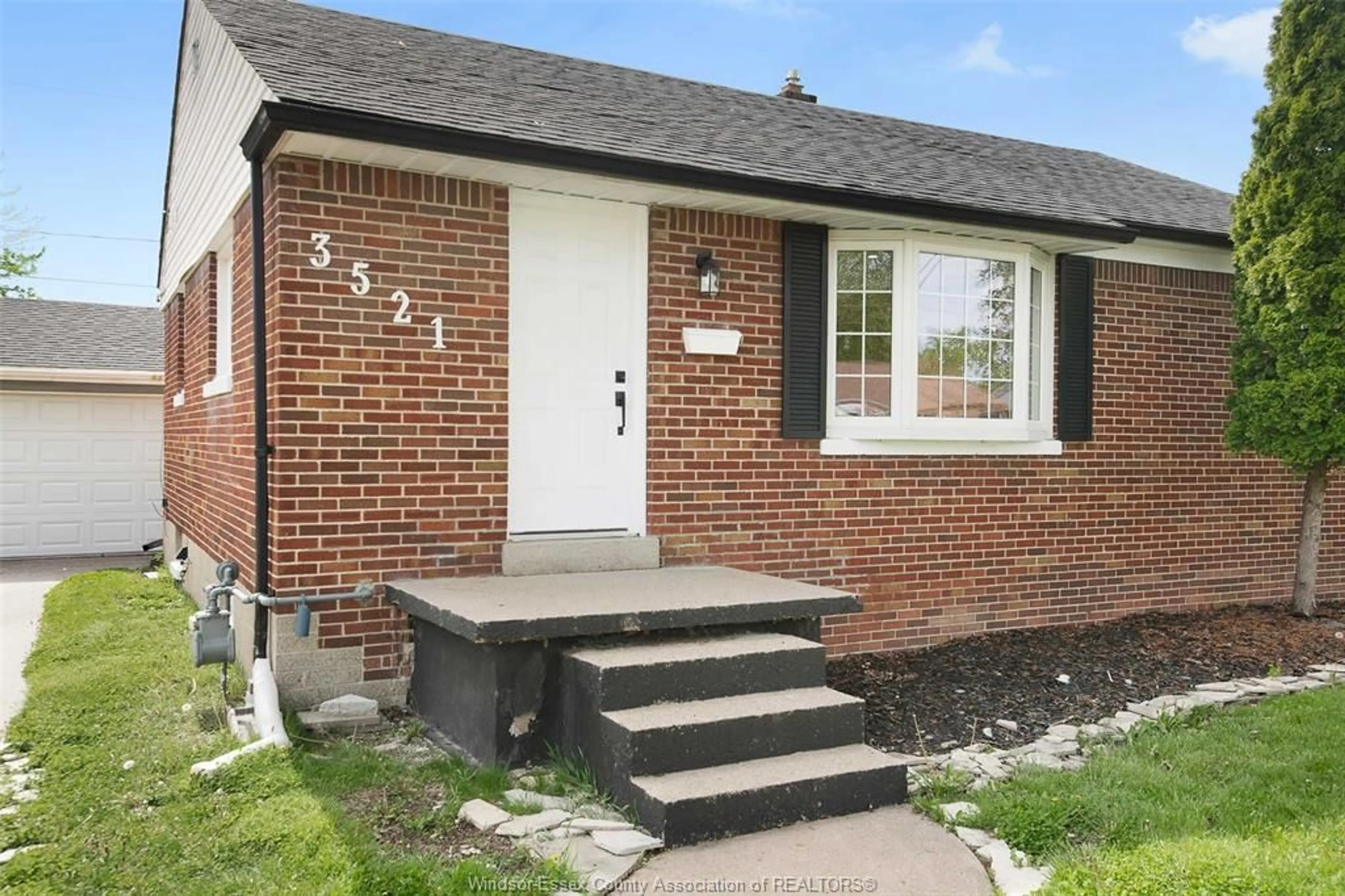 Home with brick exterior material, street for 3521 DOMINION Blvd, Windsor Ontario N9E 2P1