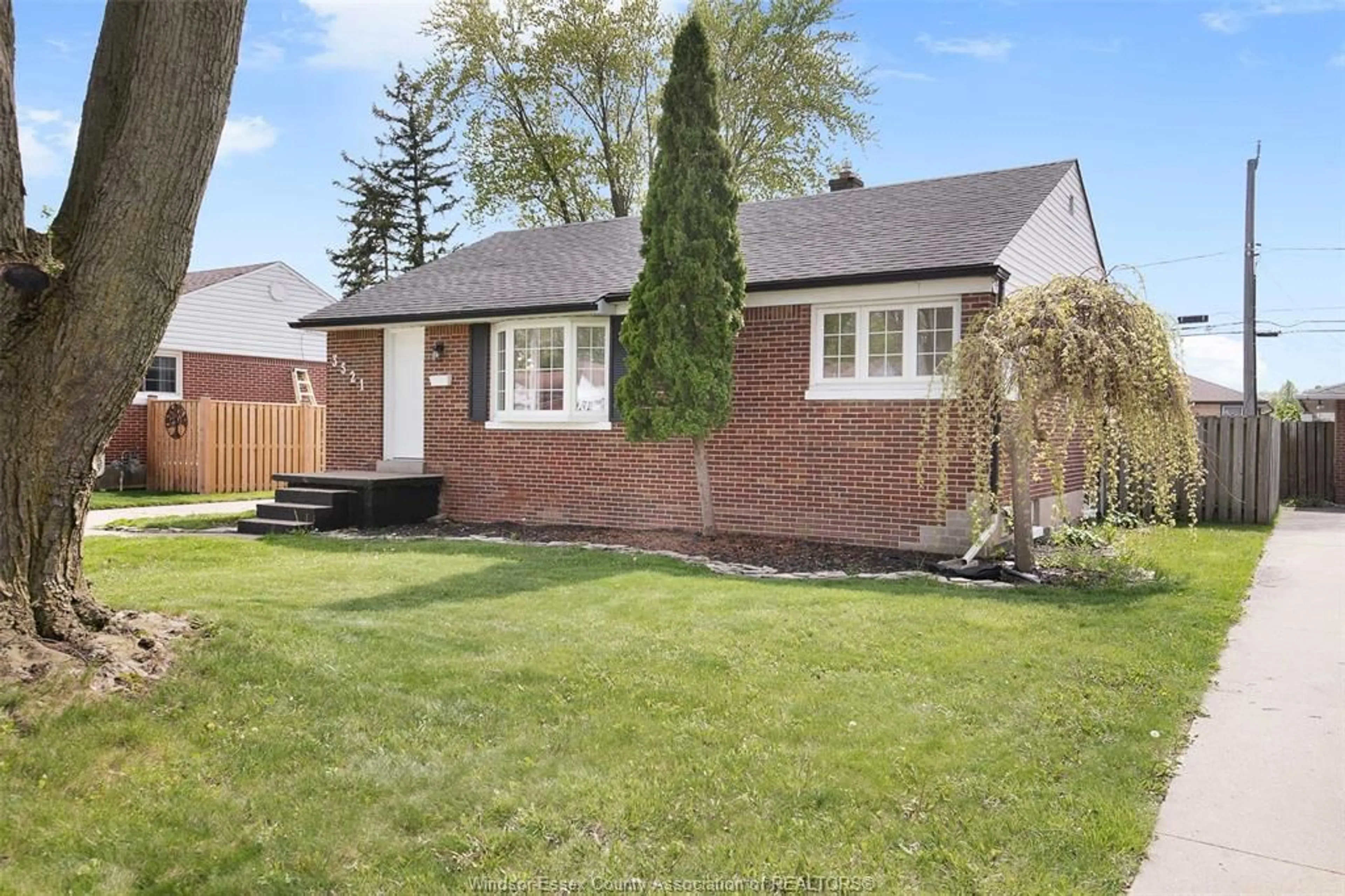 Home with brick exterior material, street for 3521 DOMINION Blvd, Windsor Ontario N9E 2P1
