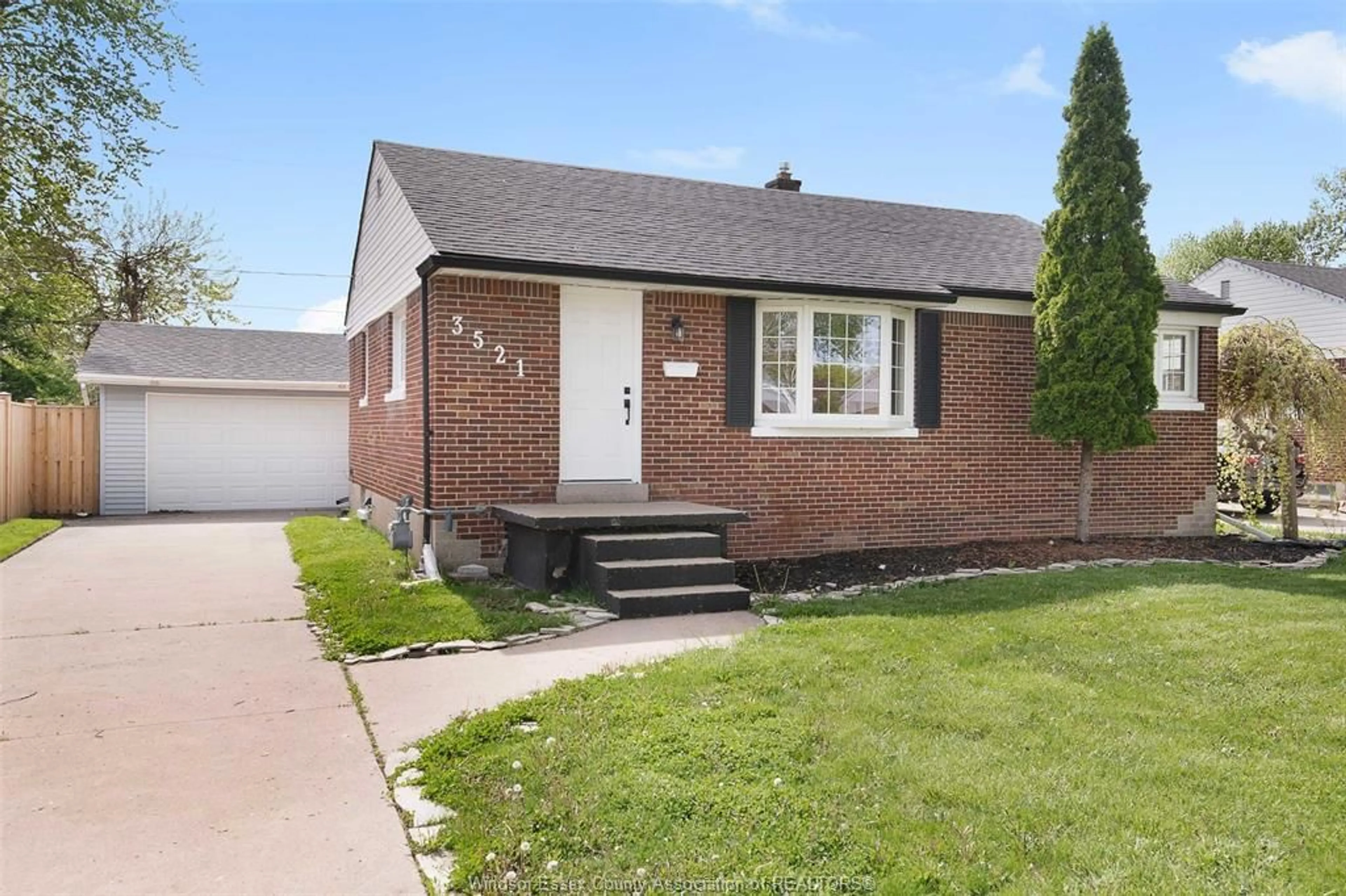 Home with brick exterior material, street for 3521 DOMINION Blvd, Windsor Ontario N9E 2P1