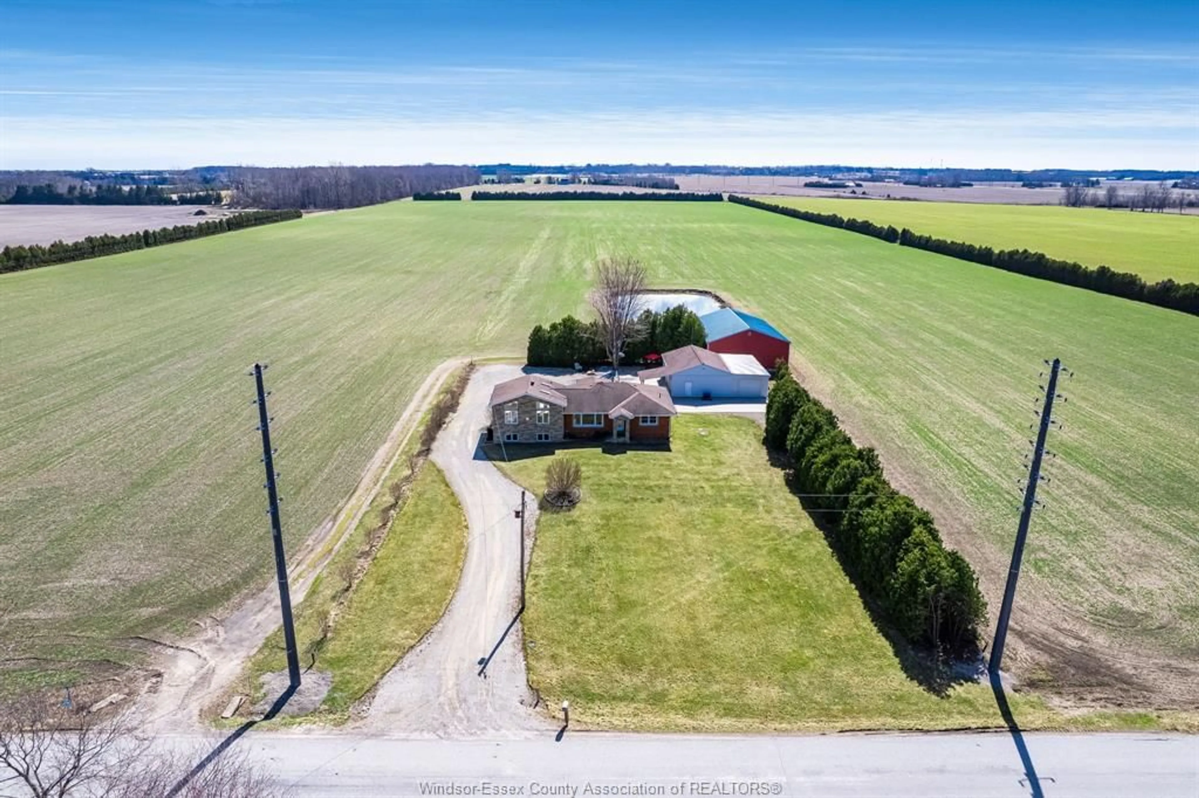 A pic from outside/outdoor area/front of a property/back of a property/a pic from drone, unknown for 208 Mersea Rd 8, Leamington Ontario N8H 3V8