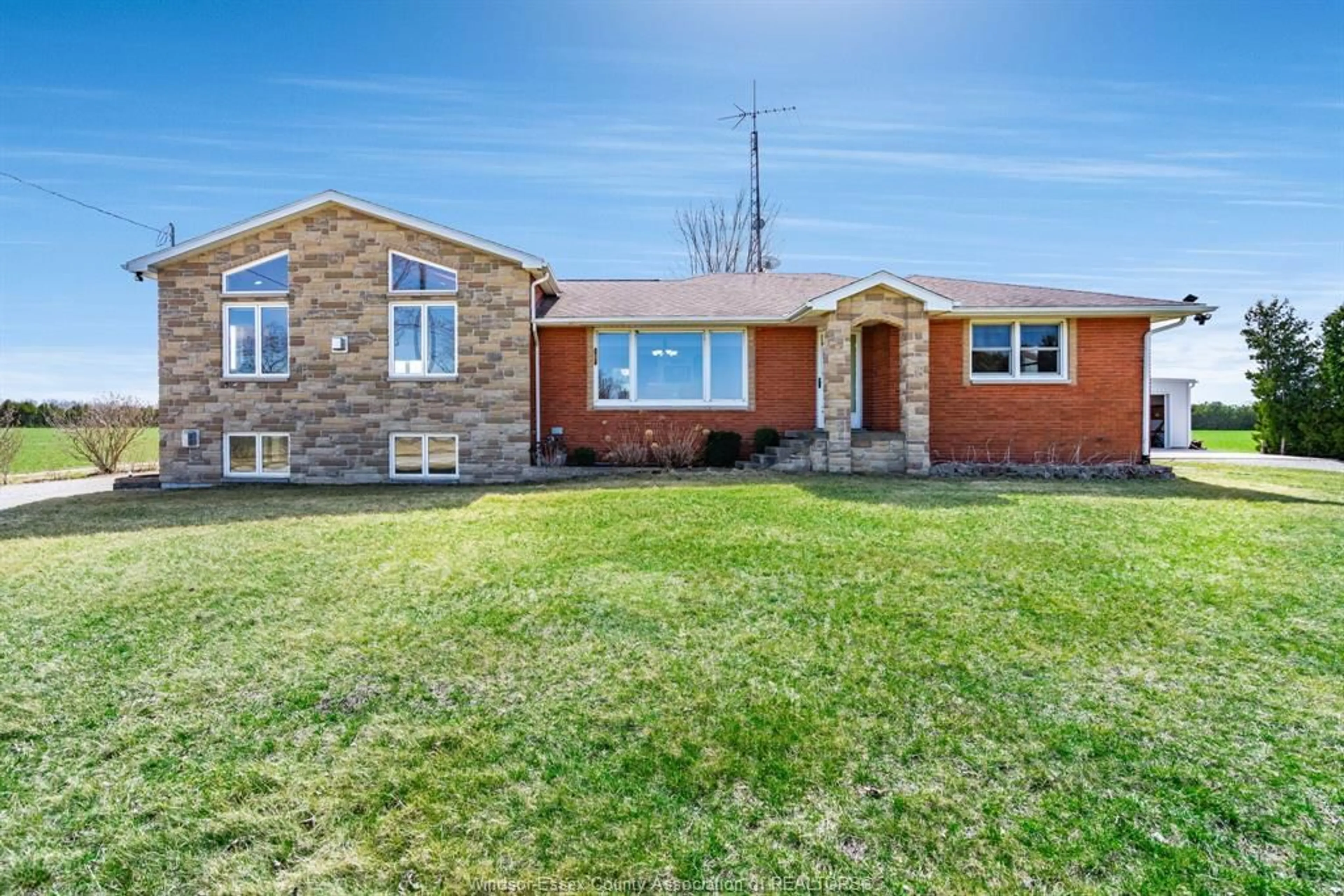 Home with brick exterior material, street for 208 Mersea Rd 8, Leamington Ontario N8H 3V8