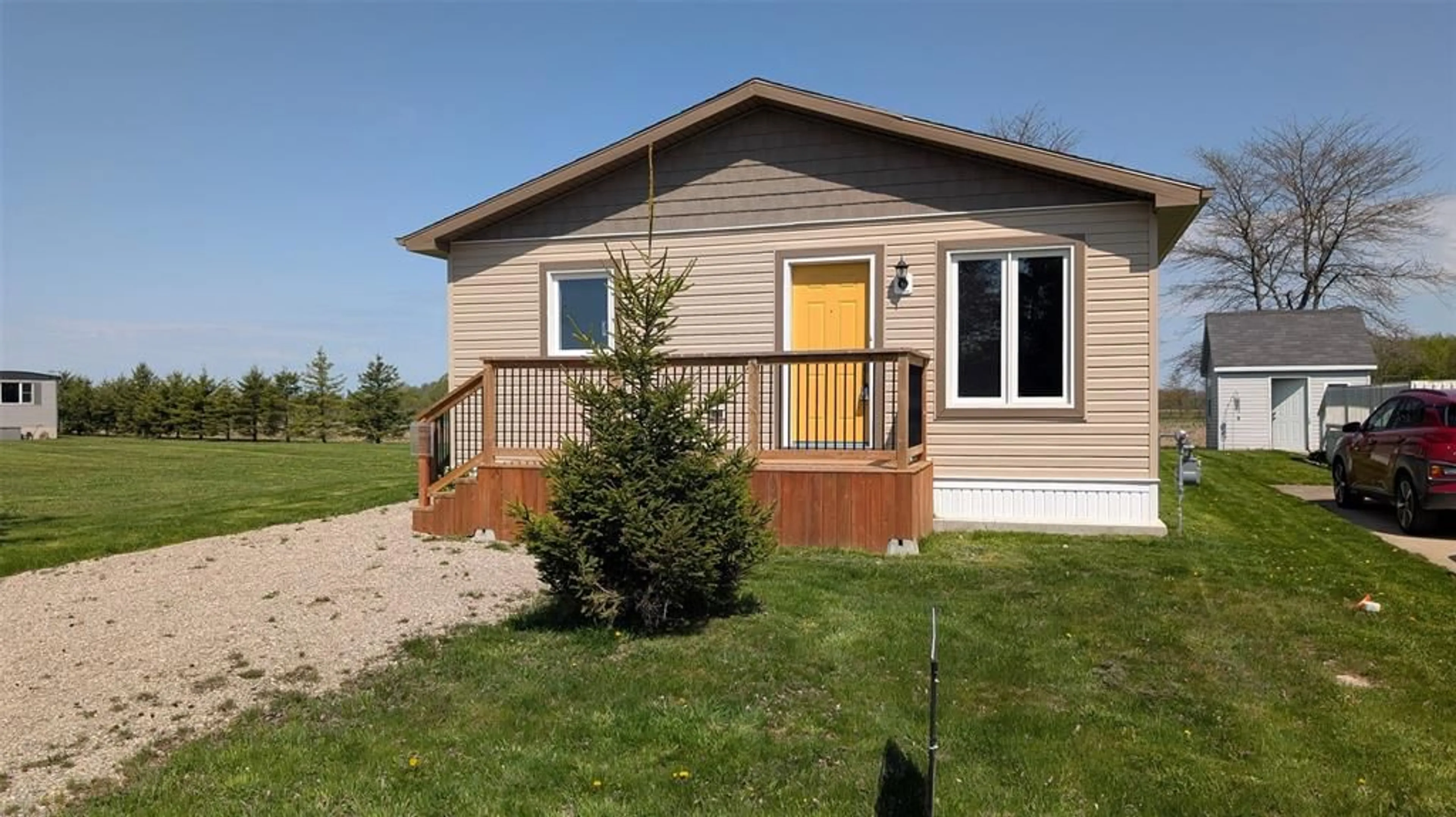 Home with vinyl exterior material, street for 2761 OIL HERITAGE Rd #25, Oil Springs Ontario N0N 1P0