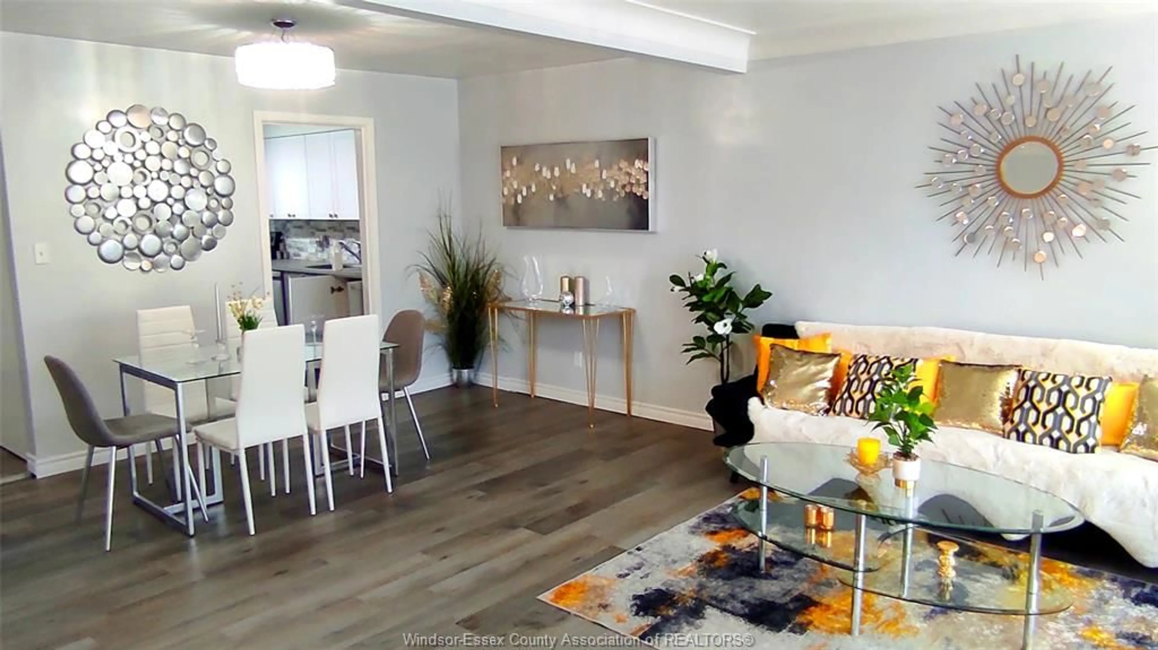 Living room with furniture, wood/laminate floor for 1711 EAST GATE ESTATES #46, Windsor Ontario N8T 2S8
