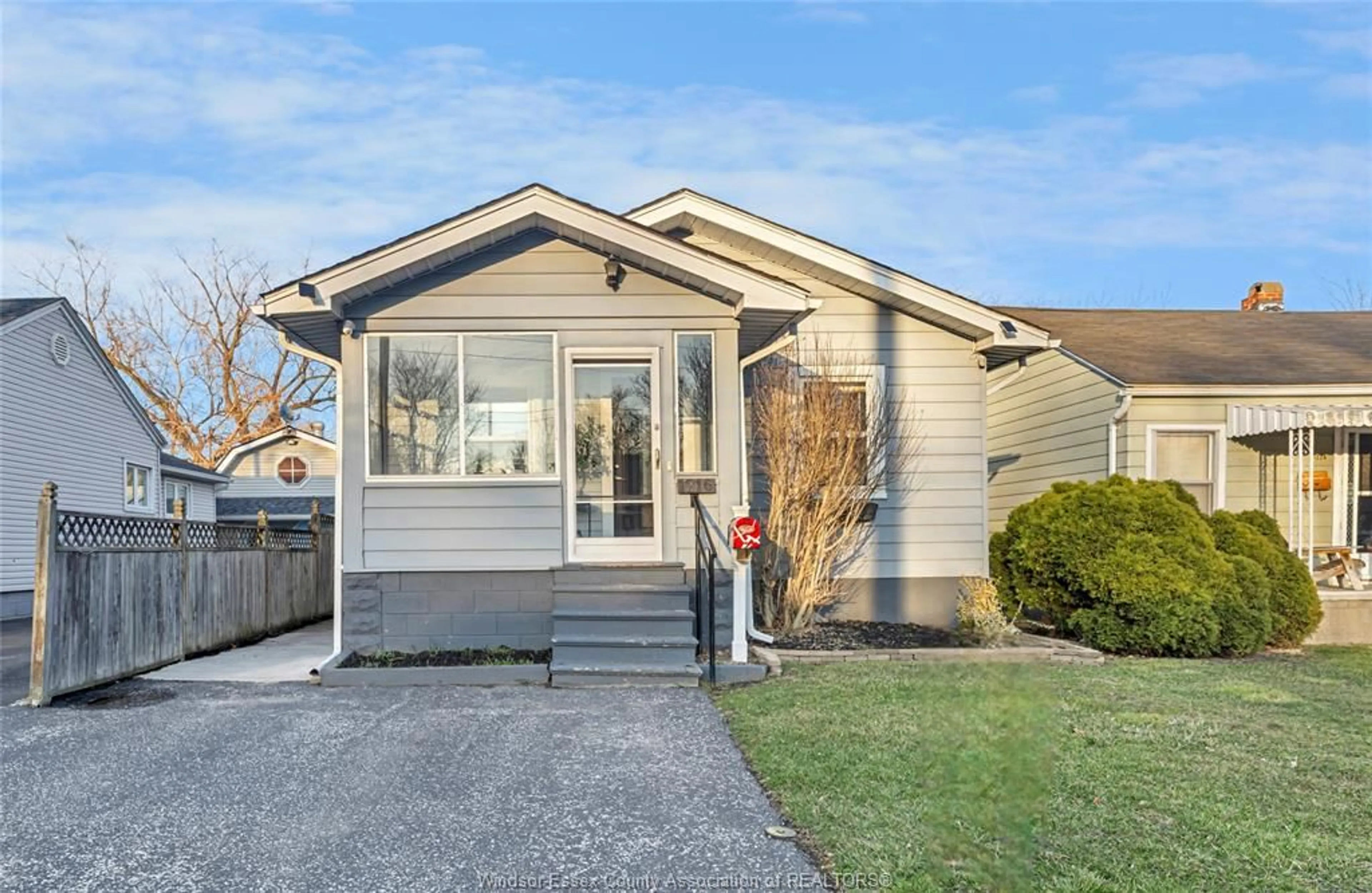 Home with vinyl exterior material, street for 1216 FELIX, Windsor Ontario N9C 3L7