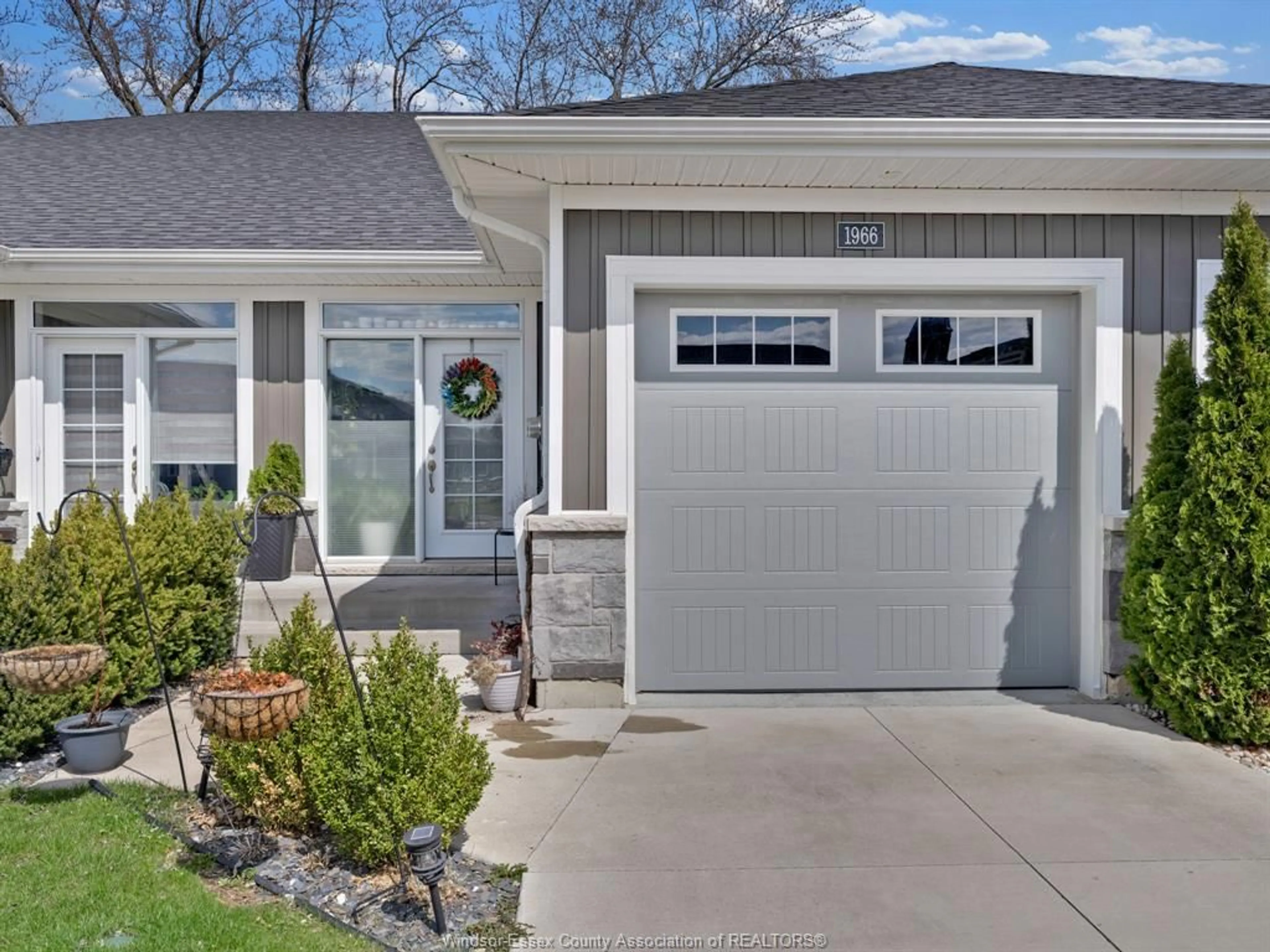 Home with vinyl exterior material, street for 1966 Ethan Crt, Windsor Ontario N8T 0B3