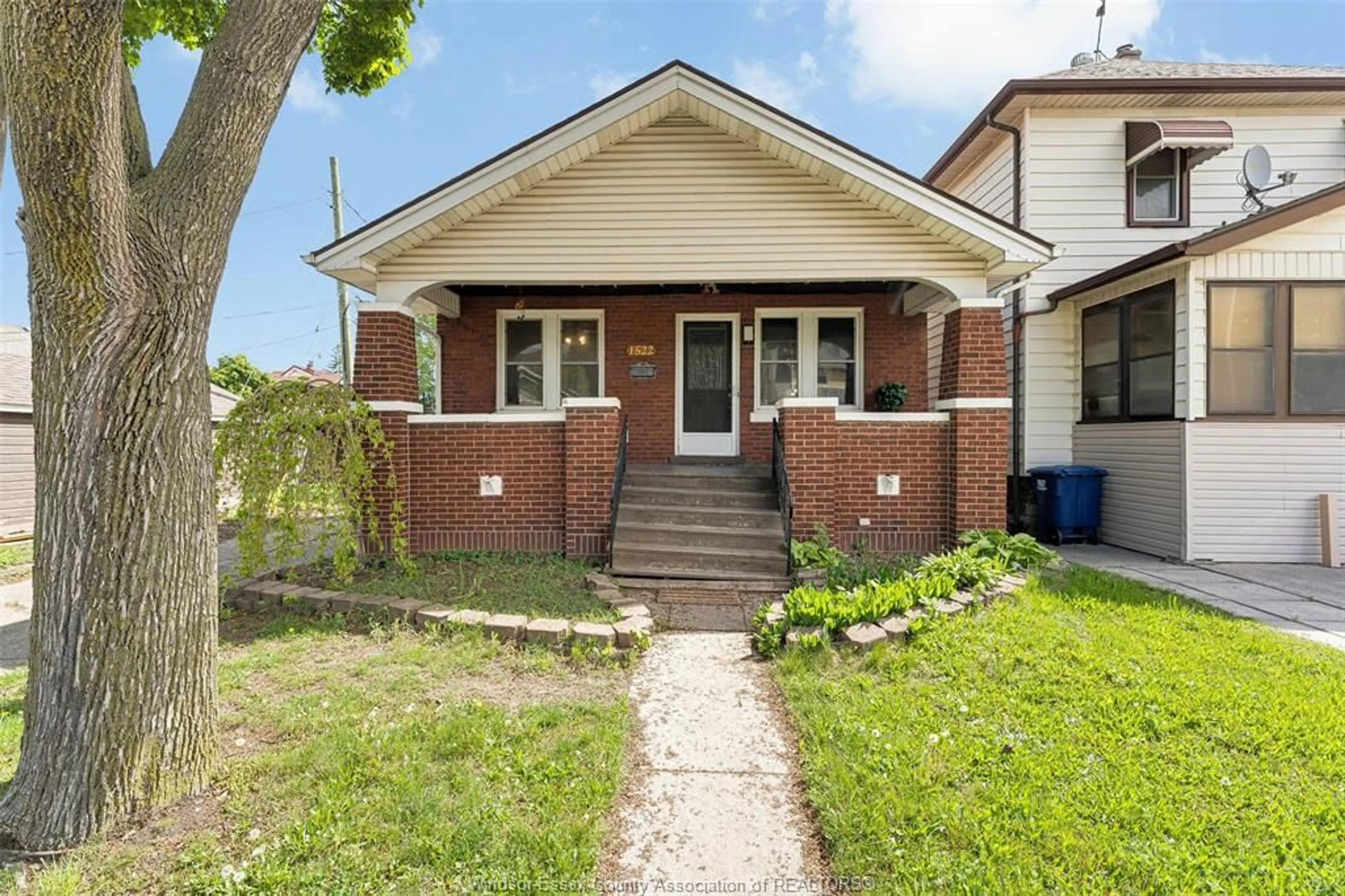 Home with brick exterior material, street for 1522 HALL, Windsor Ontario N8X 4R7