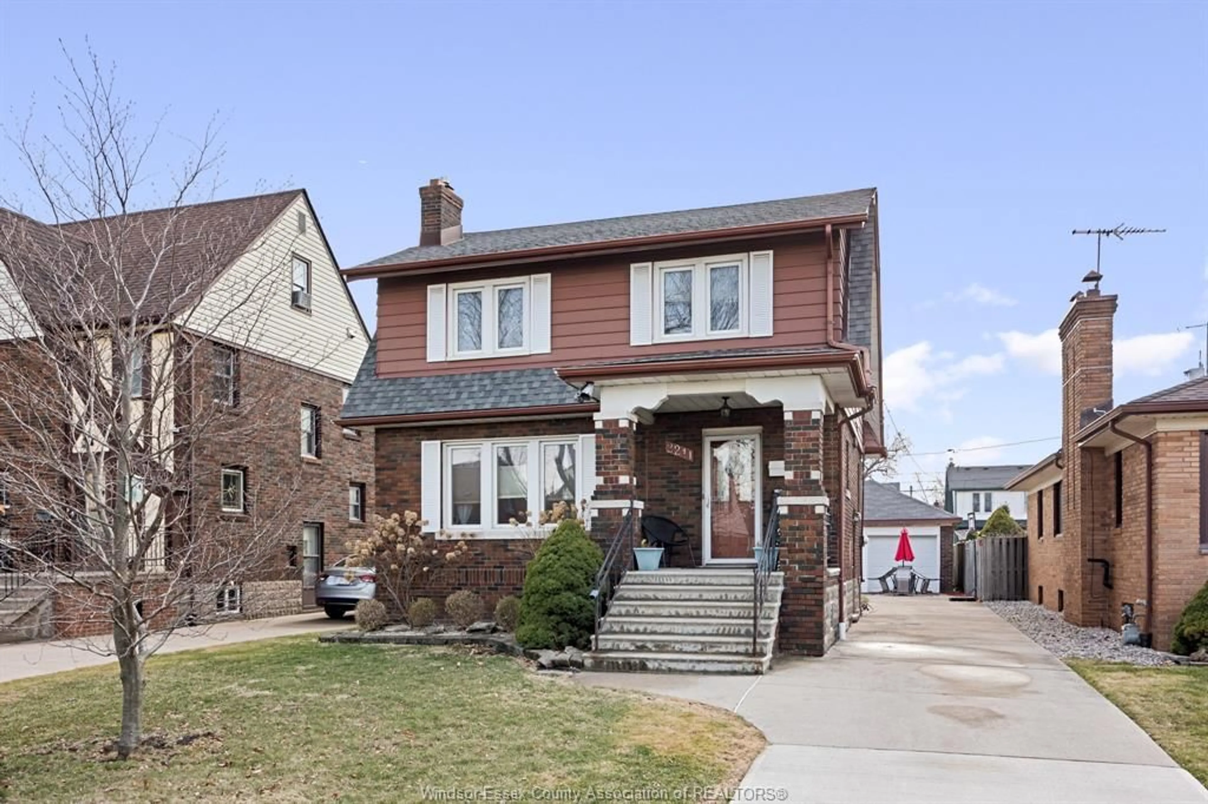 Home with brick exterior material, street for 2211 Gladstone Ave, Windsor Ontario N8W 2N8