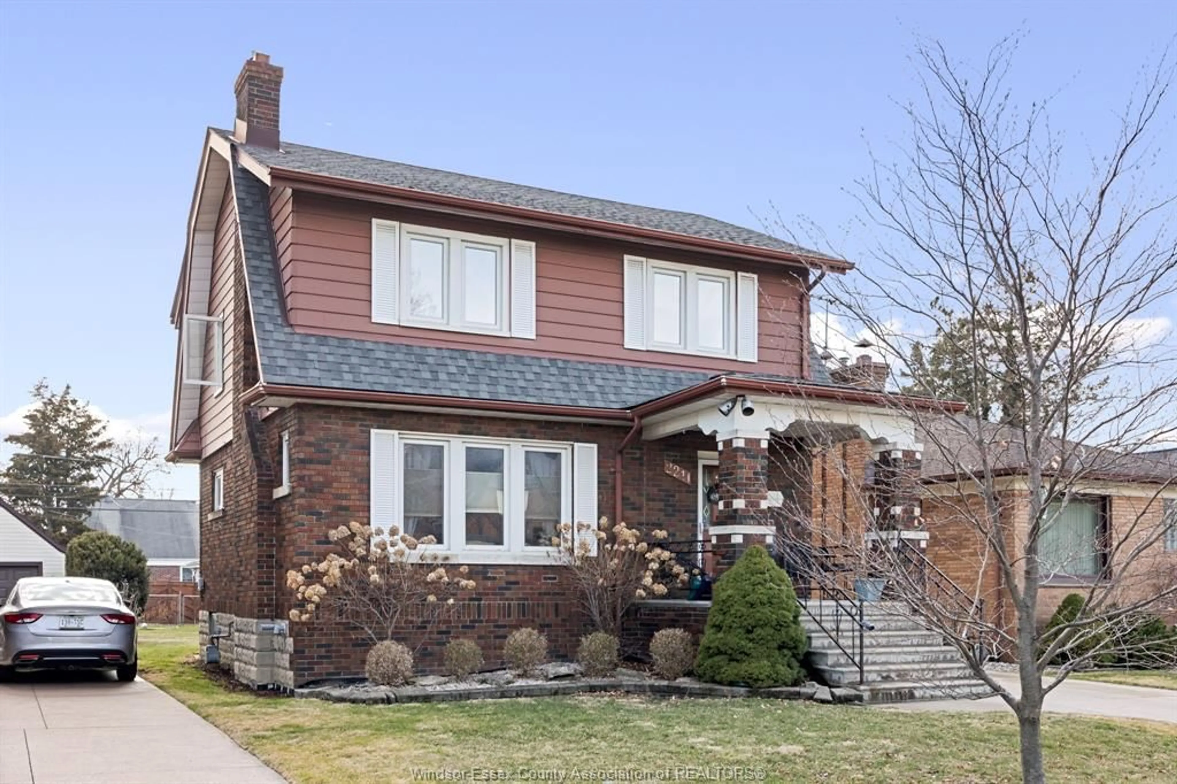 Home with brick exterior material, street for 2211 Gladstone Ave, Windsor Ontario N8W 2N8