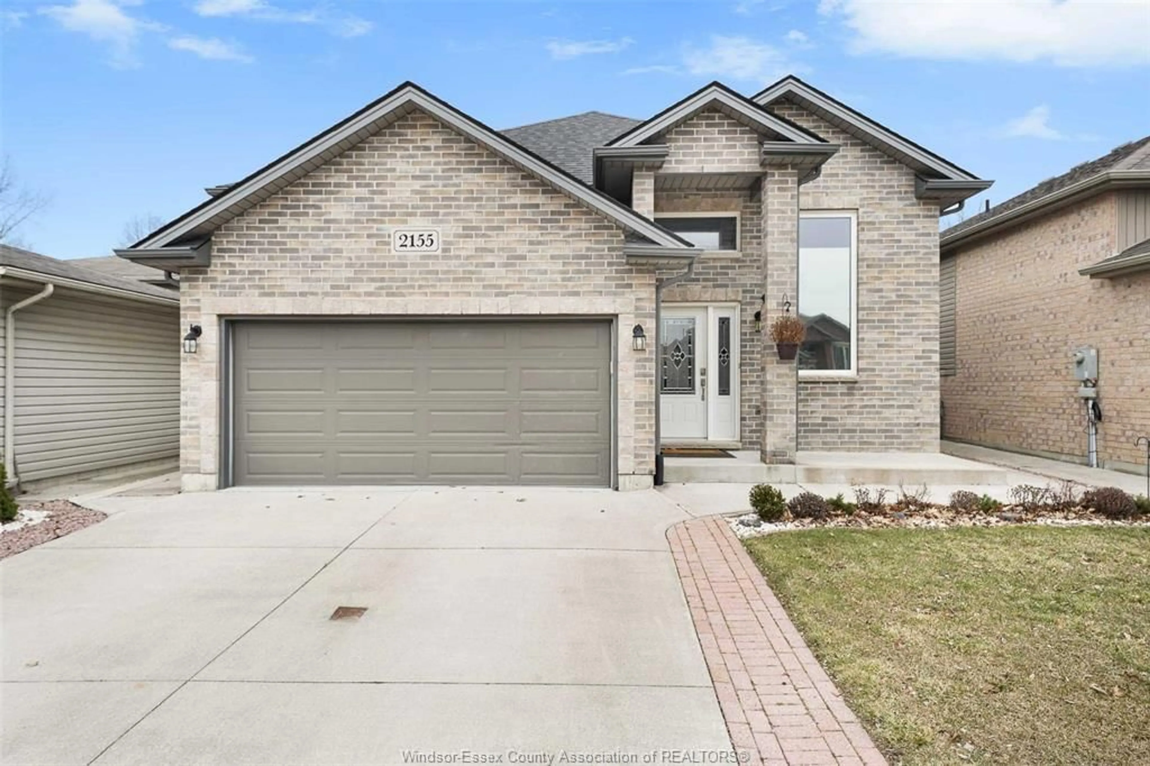 Home with brick exterior material, street for 2155 Mark Ave, Windsor Ontario N9B 3X6