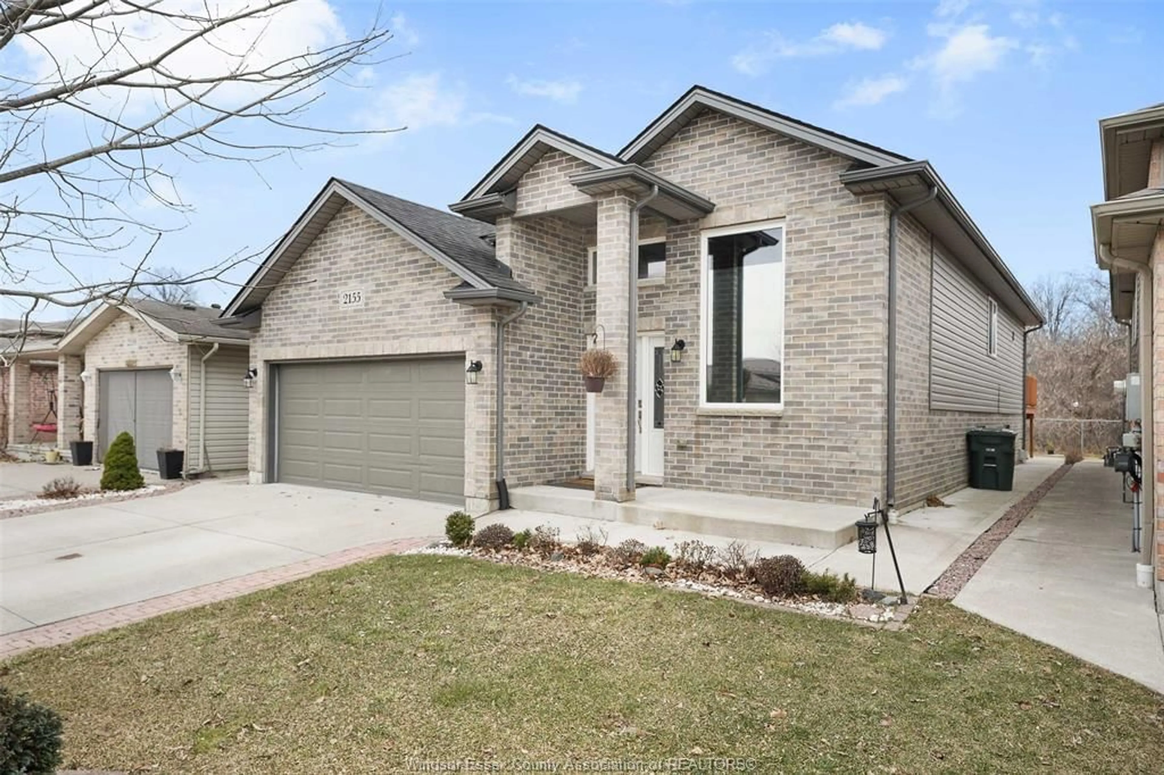 Home with brick exterior material, street for 2155 Mark Ave, Windsor Ontario N9B 3X6
