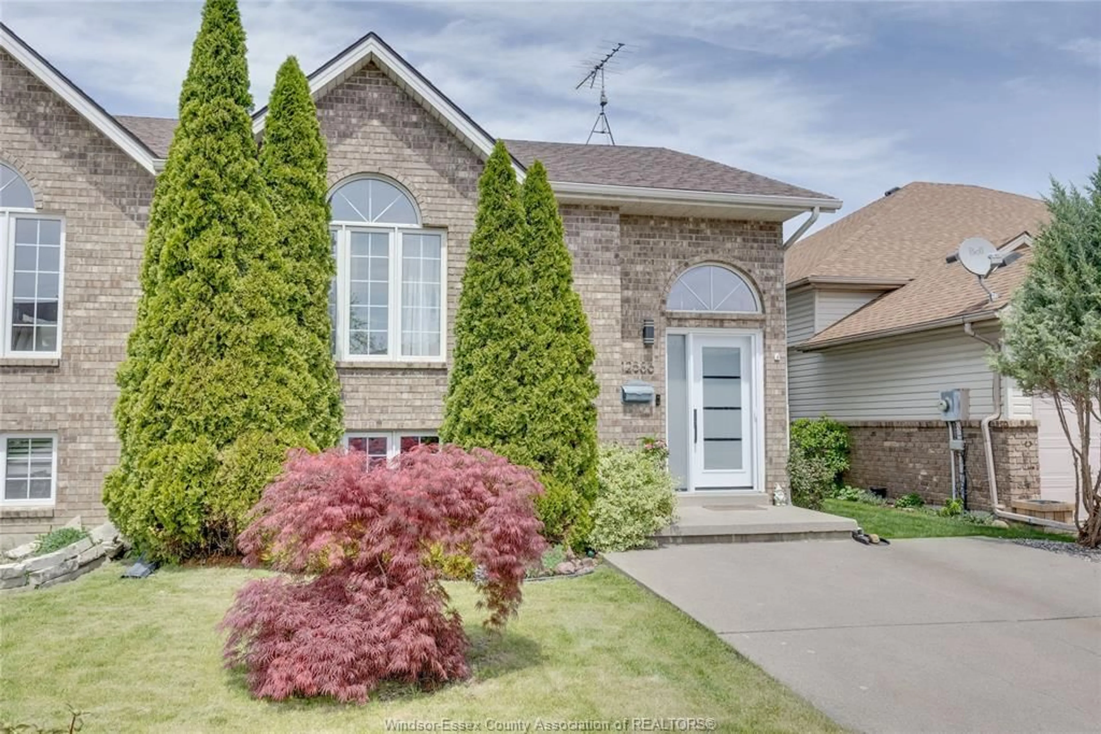 Home with brick exterior material, street for 12586 HORWOOD Cres, Tecumseh Ontario N8N 4T7